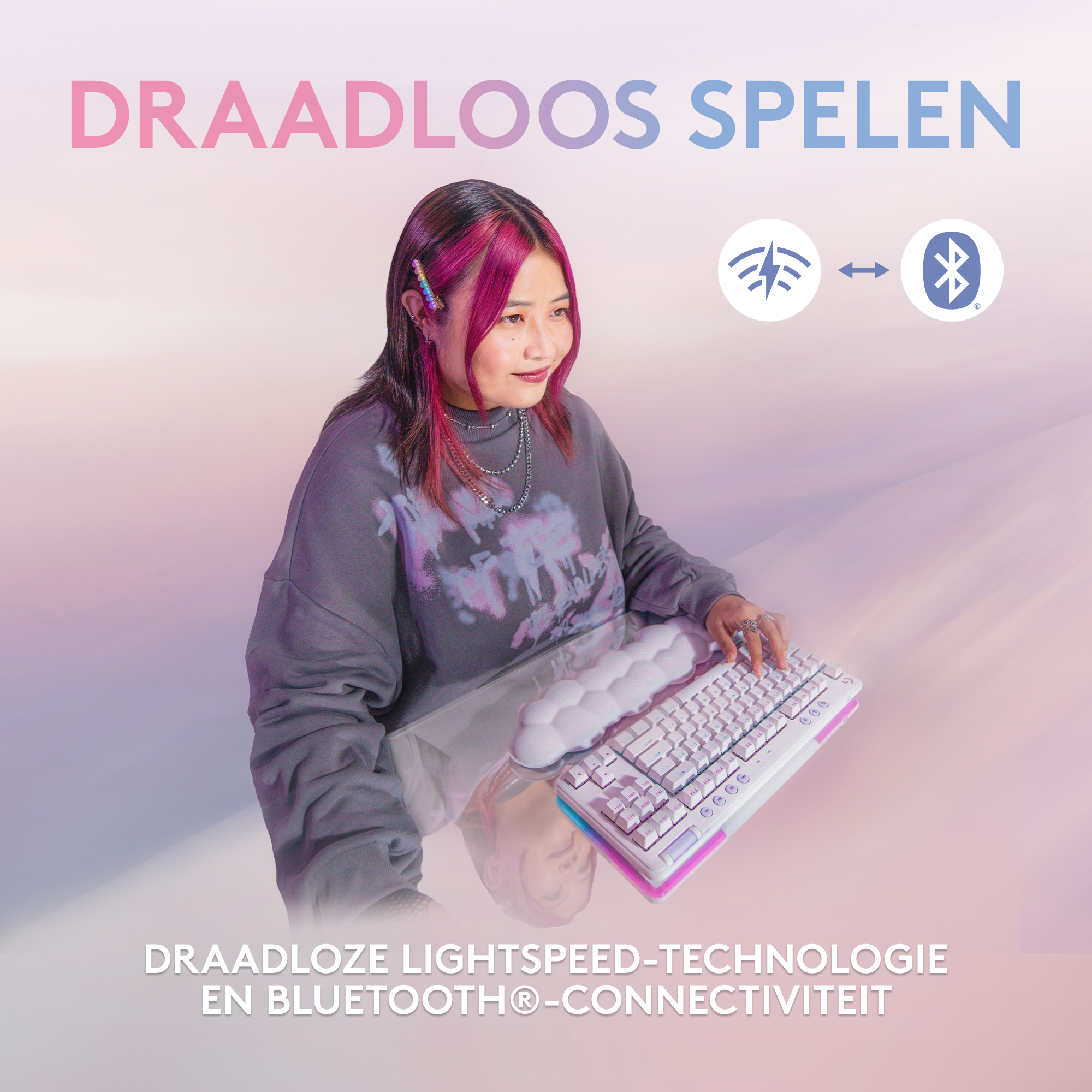 Donna che usa una tastiera bianca e rosa, con simboli Bluetooth e wireless.