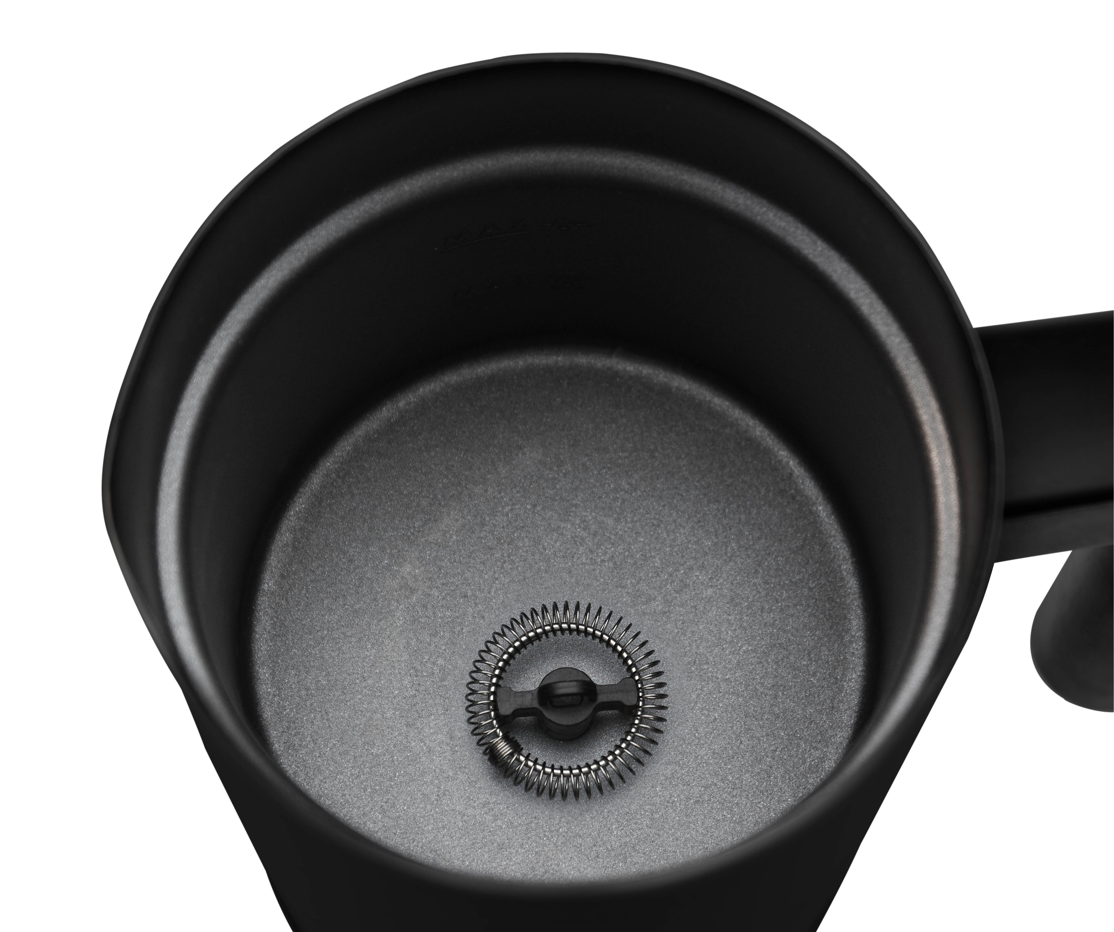 Close up of a black milk frother. The inside has a whisk at the bottom.