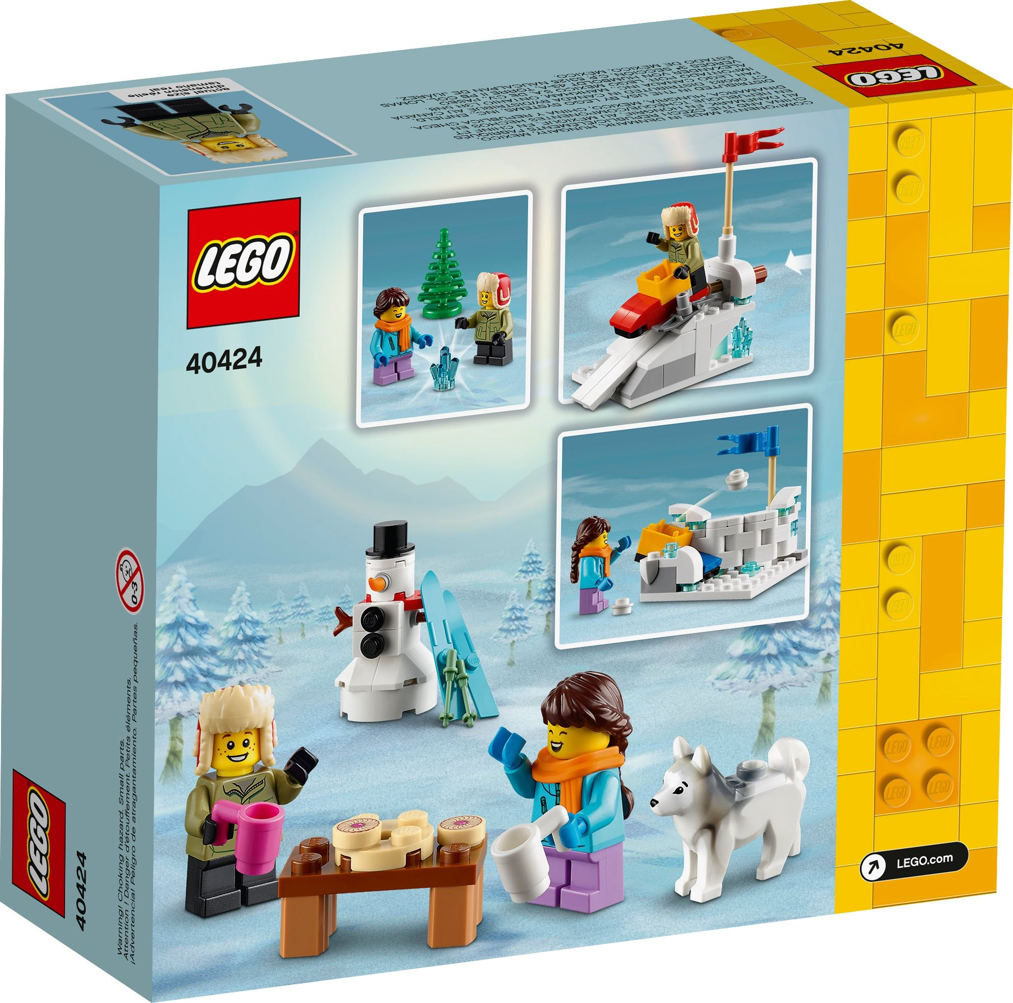 Bir Lego kutusu, Lego figürlerinin kış sahnesi inşa ettiği çizimlerle.