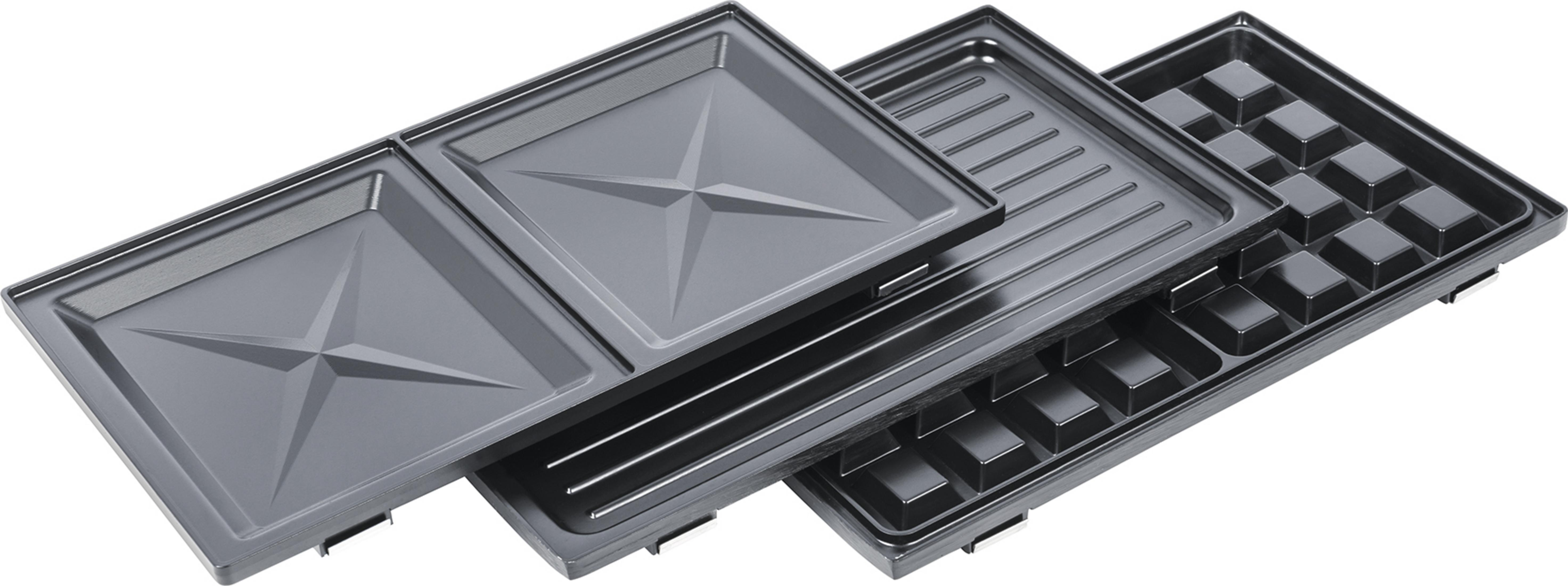 Vier schwarze Grillplatten für einen Grill. Verschiedene Formen und Oberflächendesigns sichtbar.