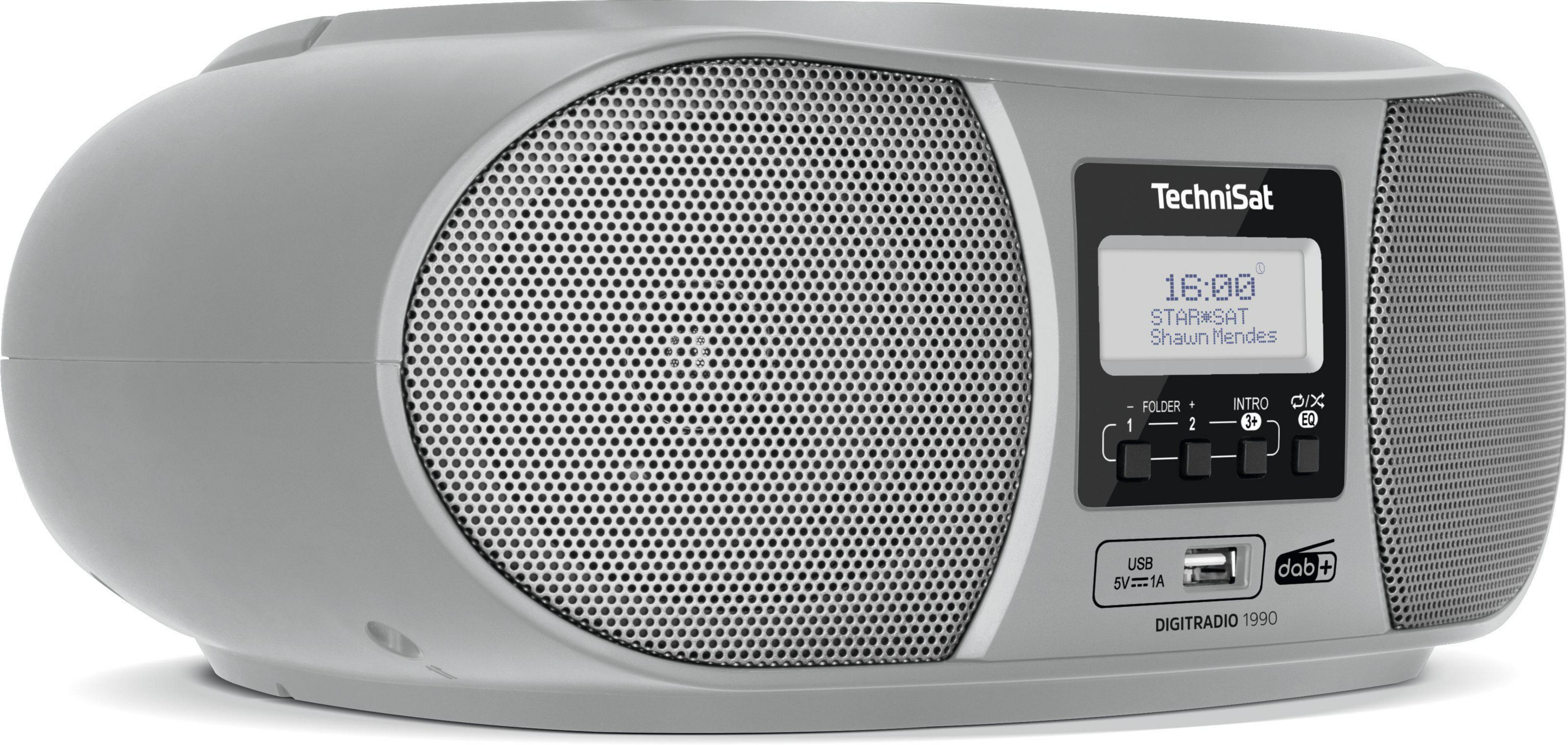 Radio grise avec un affichage numérique indiquant l'heure, le nom de la station et le titre de la chanson. Boutons et port USB visibles.