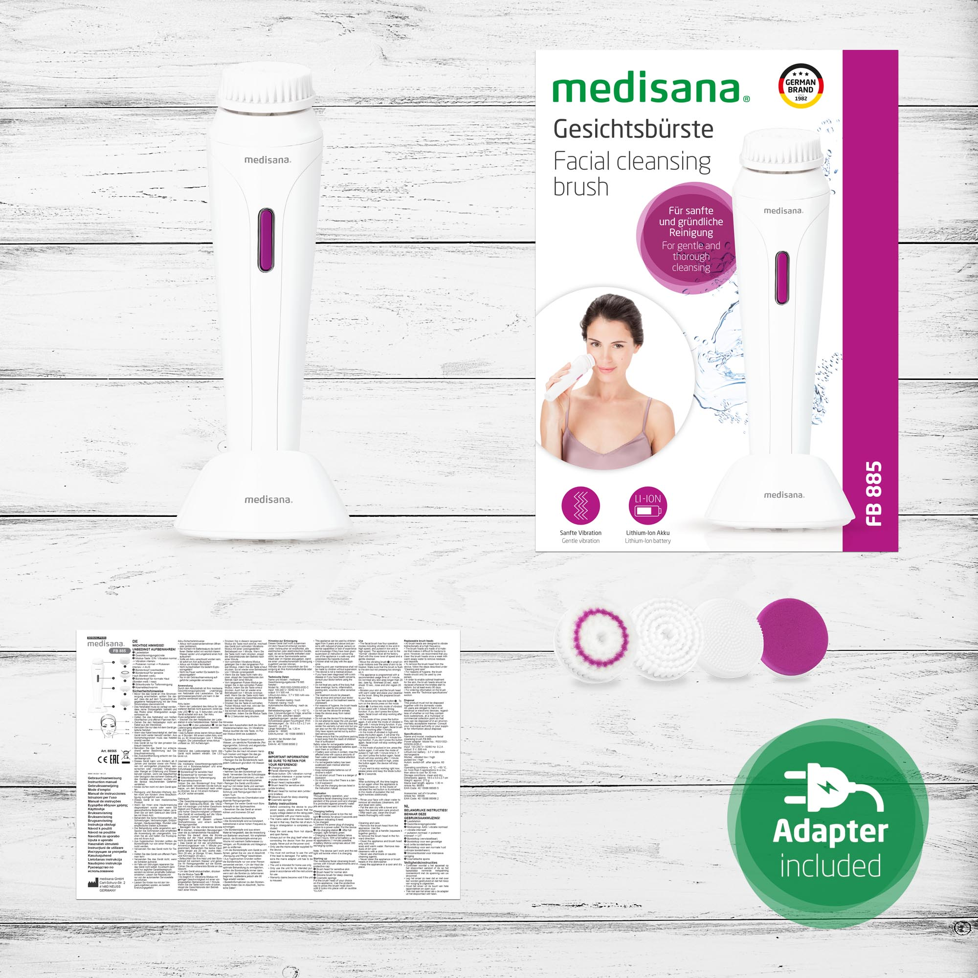 Facial cleansing brush with accessories and packaging, including a box and instructions.