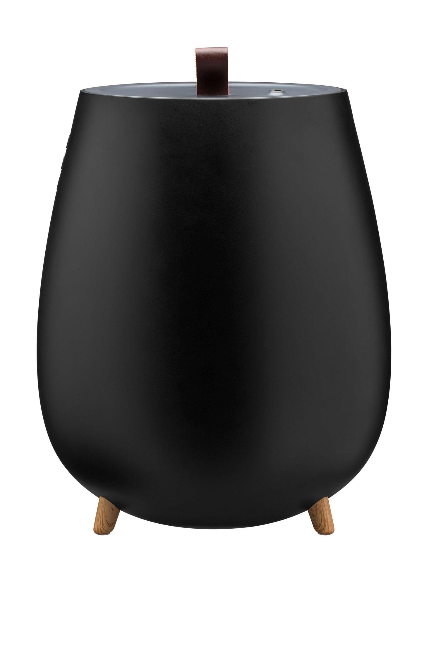 Czarny, jajowaty nawilżacz powietrza. Ma drewniane nóżki i skórzany uchwyt.
