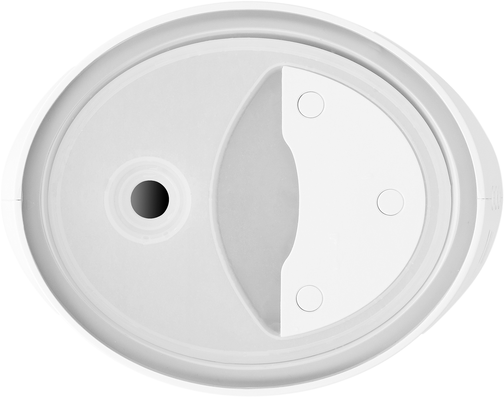 Biały obiekt o okrągłym kształcie, z otworem i trzema kropkami.