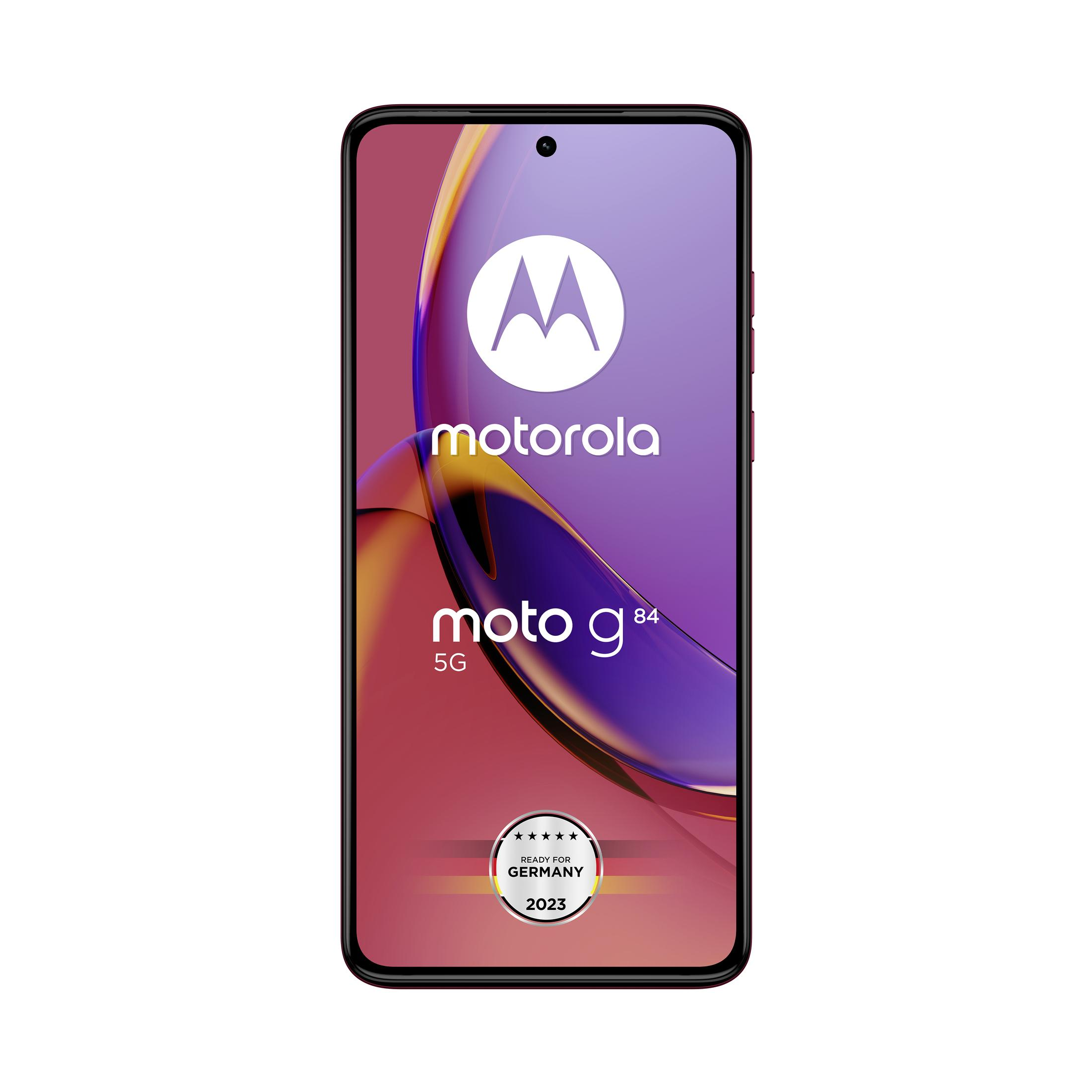 Smartfon Motorola Moto g84 5G z fioletowo-złotym gradientem w tle.