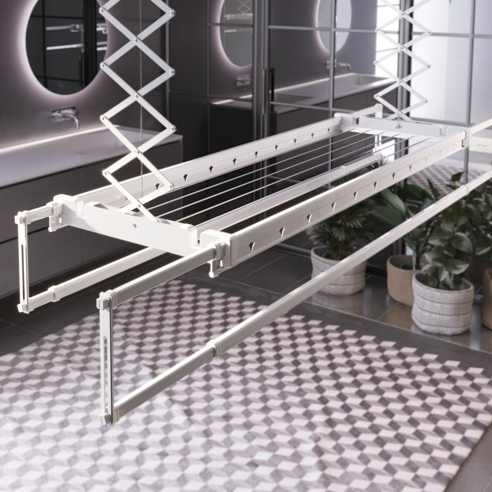 Stendibiancheria bianco a soffitto in un bagno moderno con piante.