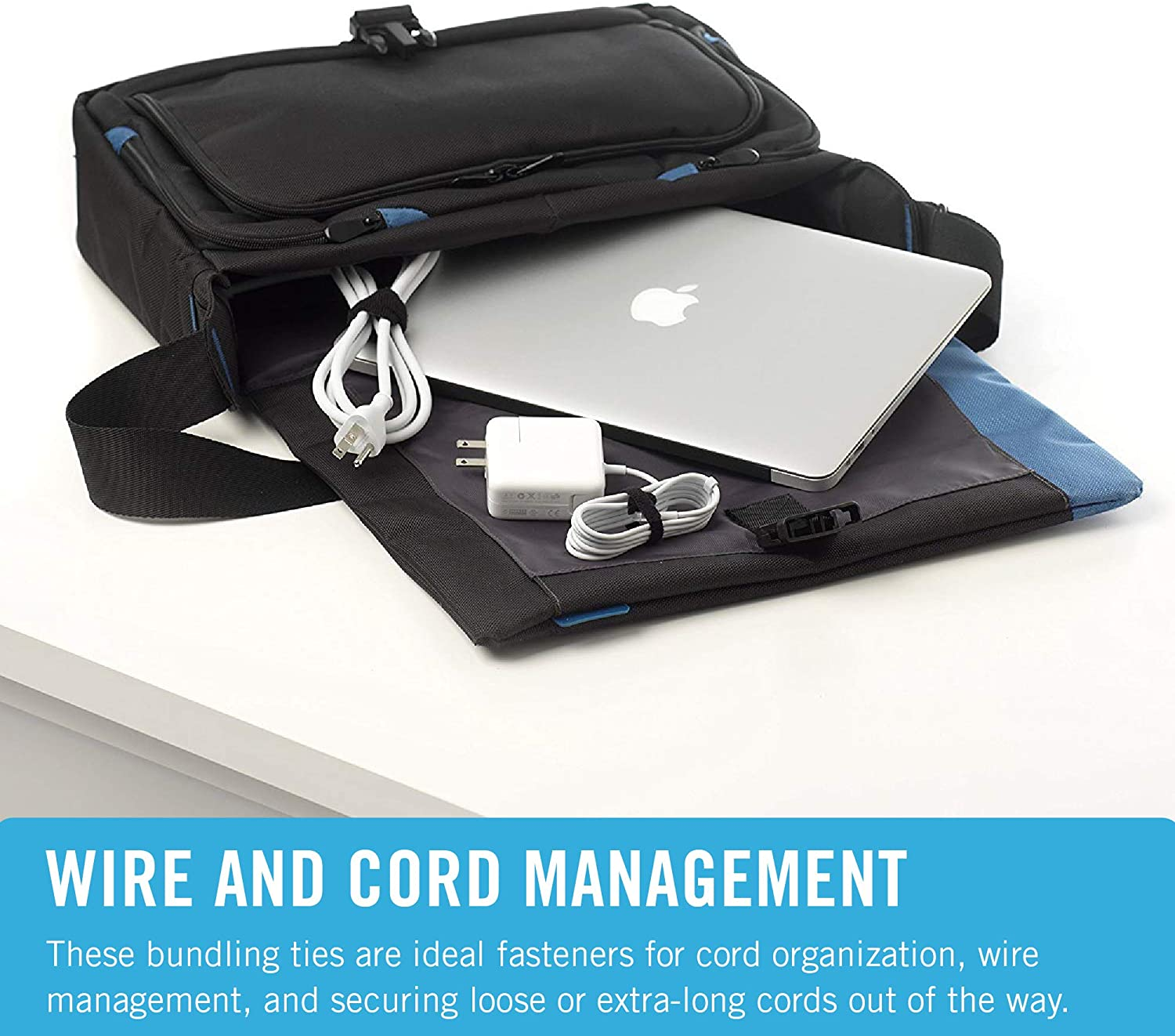 A black laptop bag open with a laptop, charger, and cable ties inside.