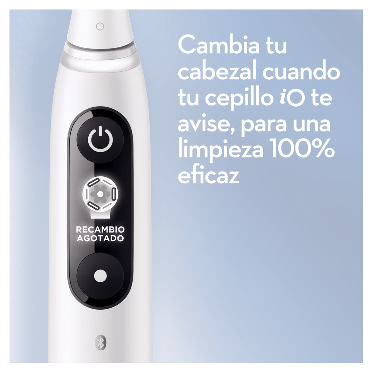 Primer plano de cepillo dental eléctrico mostrando el indicador de reemplazo en el mango.