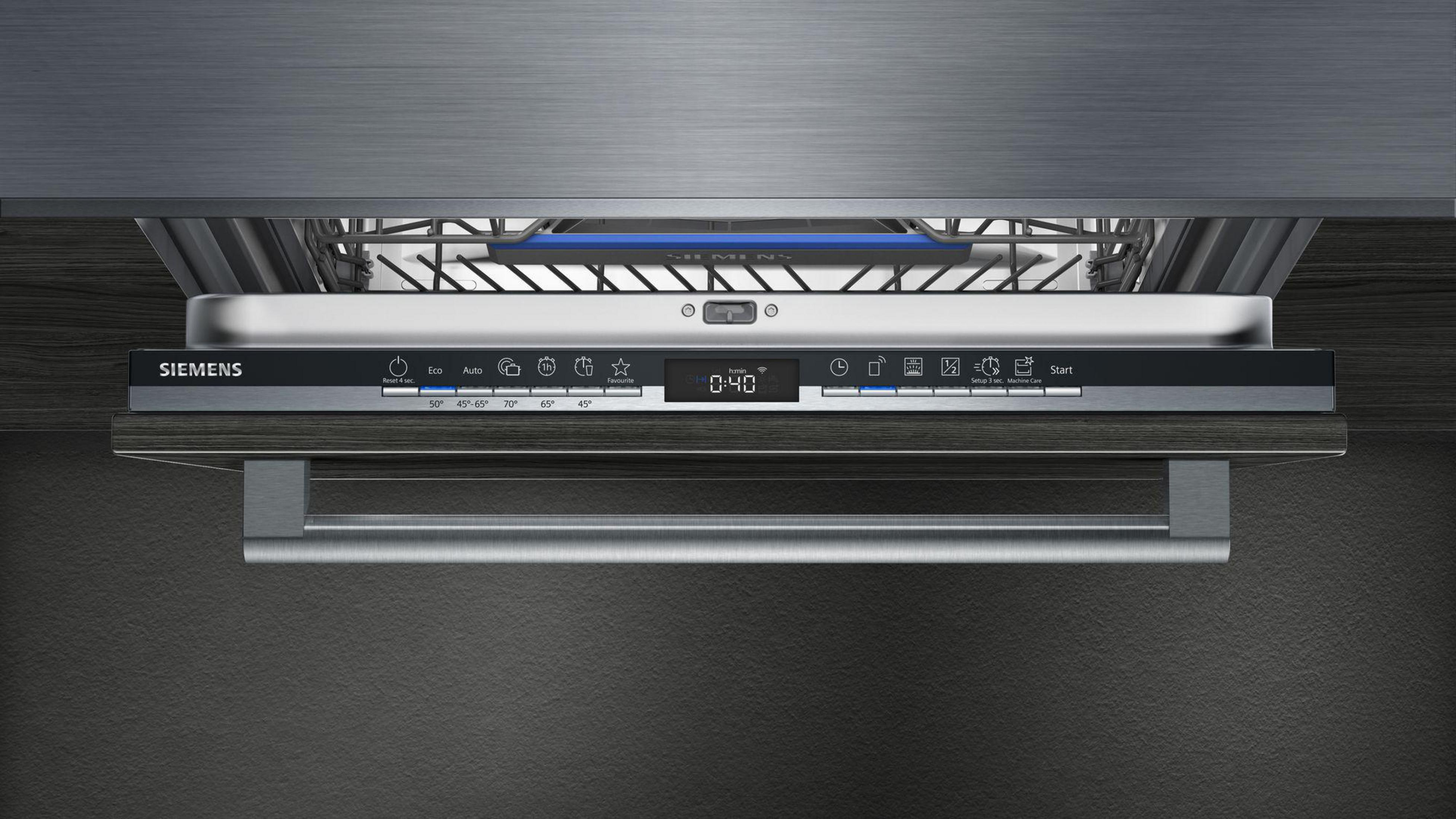 Dishwasher control panel with digital display, buttons, and a handle.