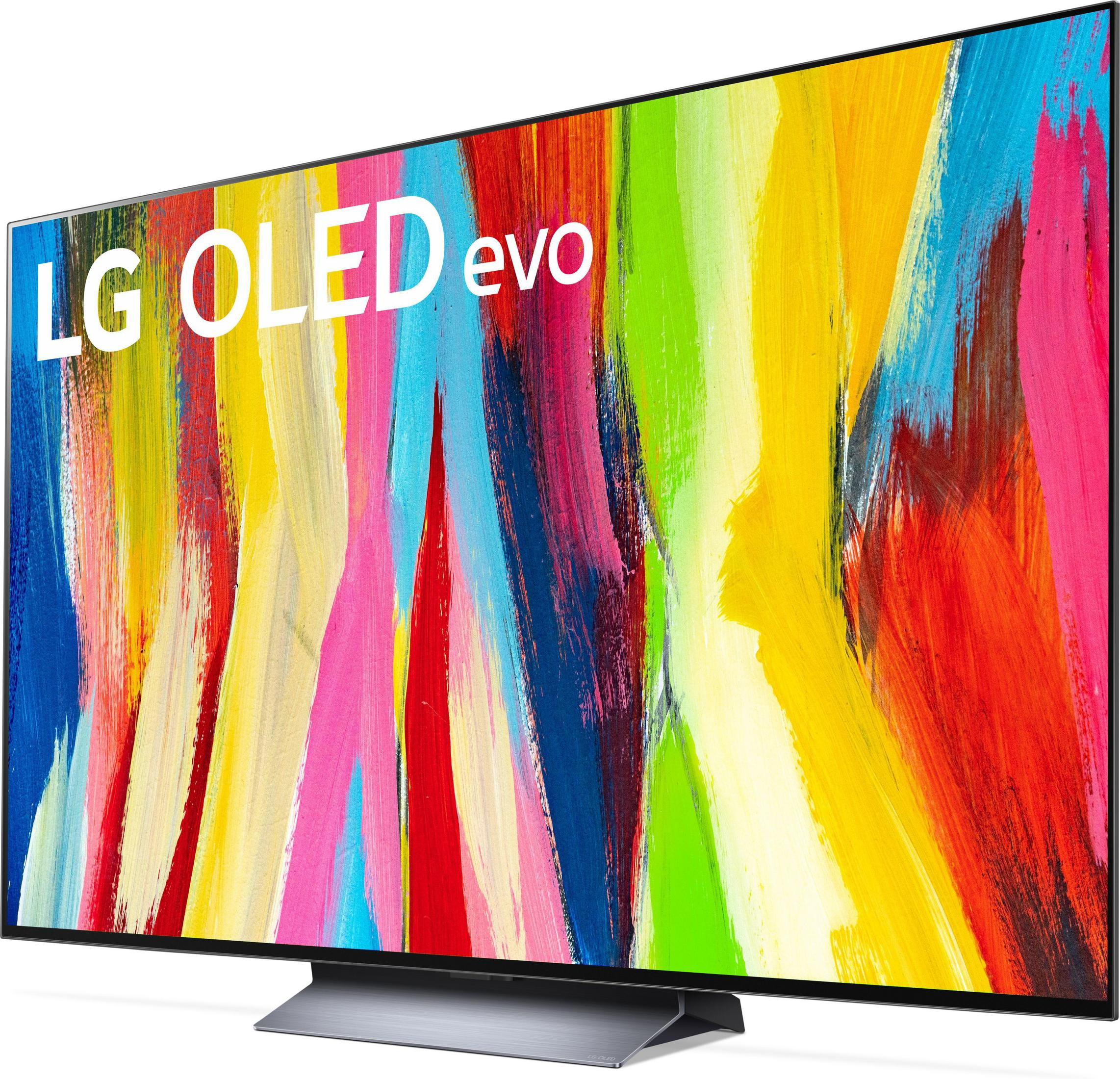 Televisor LG OLED evo con arte abstracto colorido. El televisor está sobre un soporte plateado.