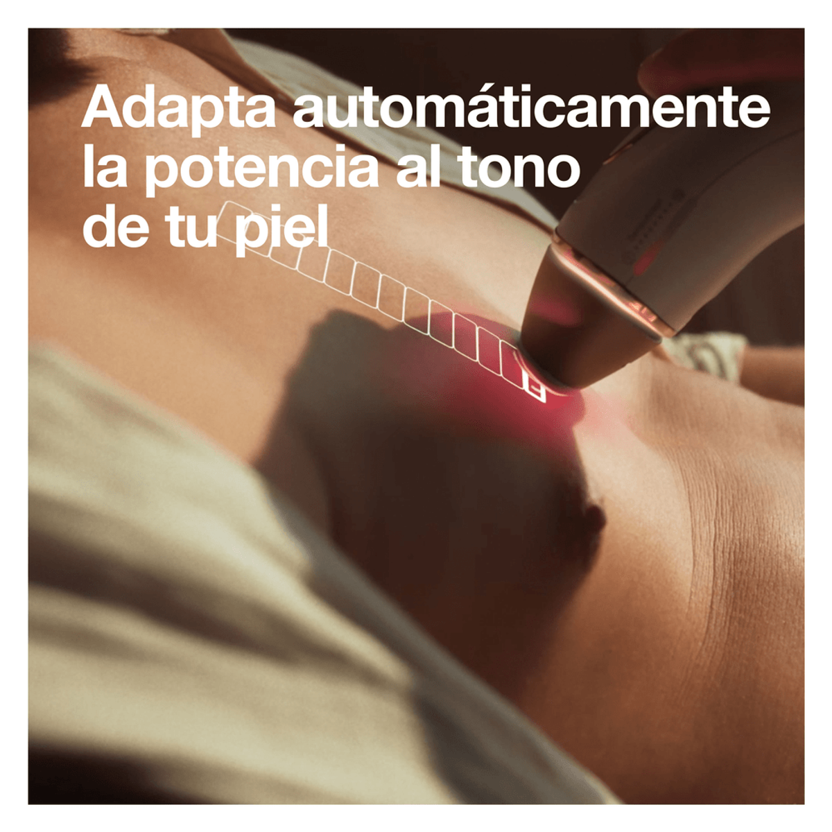 Klatka piersiowa osoby z tekstem: Automatycznie dostosowuje moc do odcienia skóry.