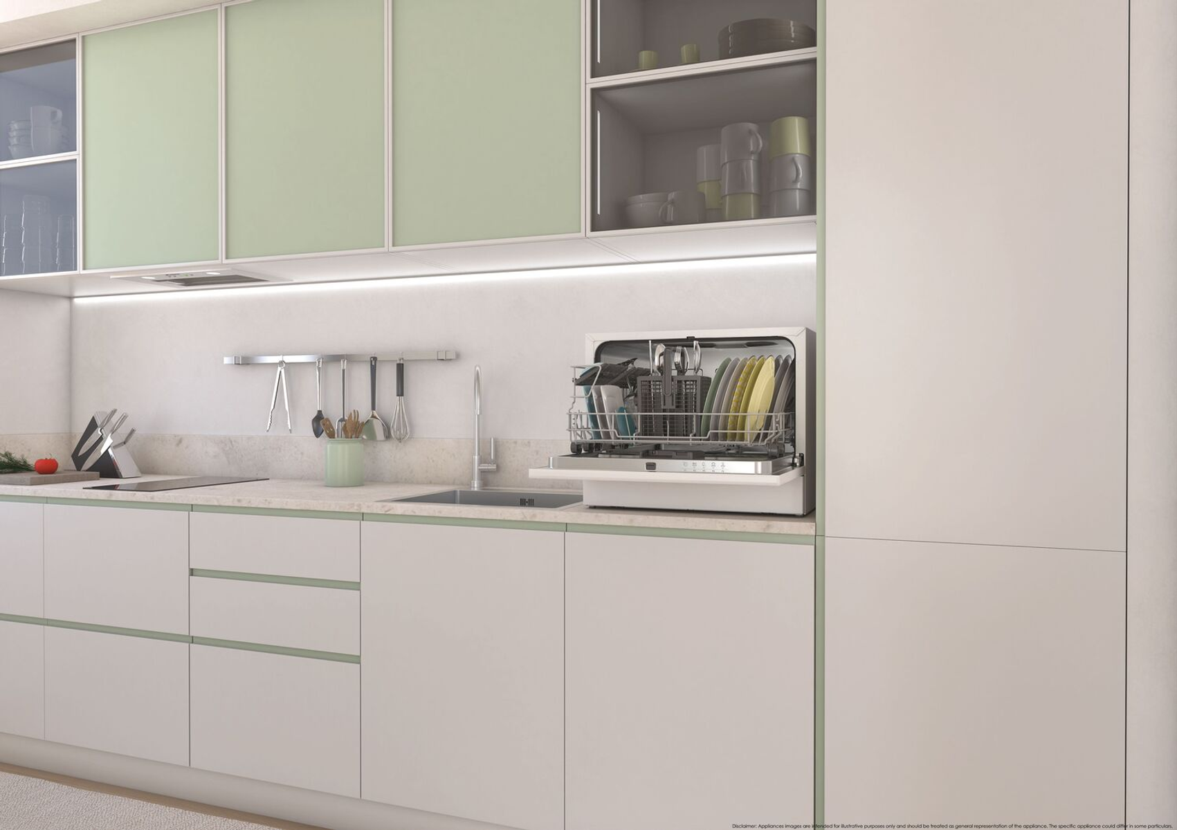 Una cucina moderna con mobili bianchi e verdi. Una lavastoviglie aperta, piena di piatti.