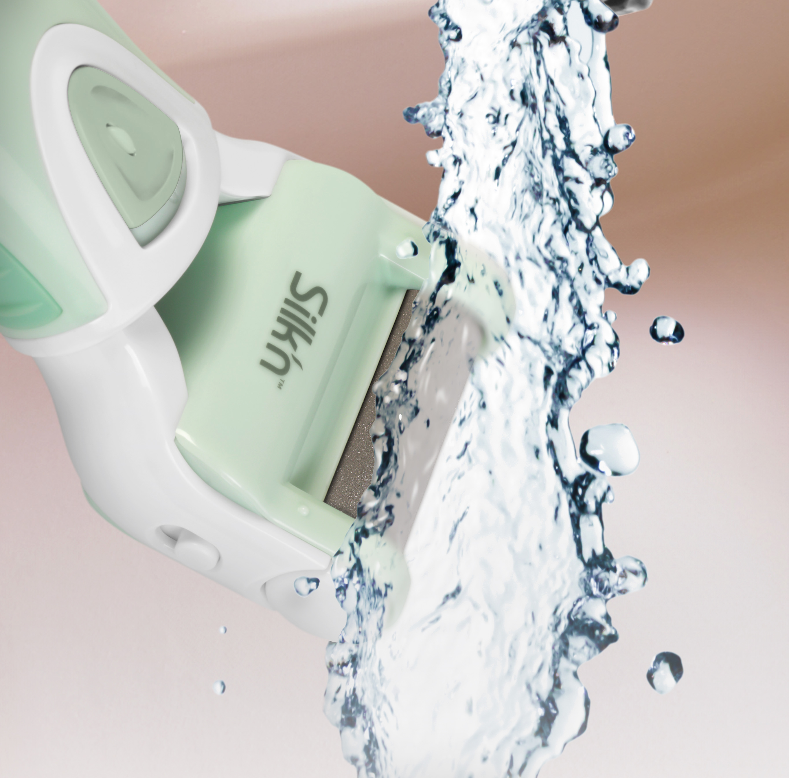 Ein grünes und weißes Fußpflegegerät mit Wasserstrahl.