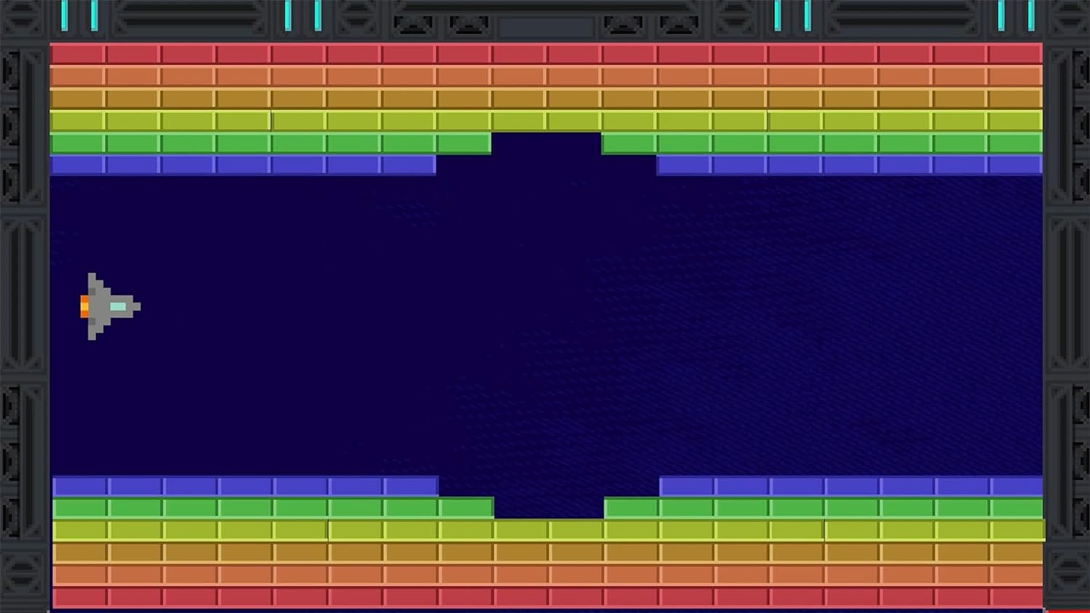 Ekran gry wideo retro z cegłami i statkiem kosmicznym. Niebieskie tło.