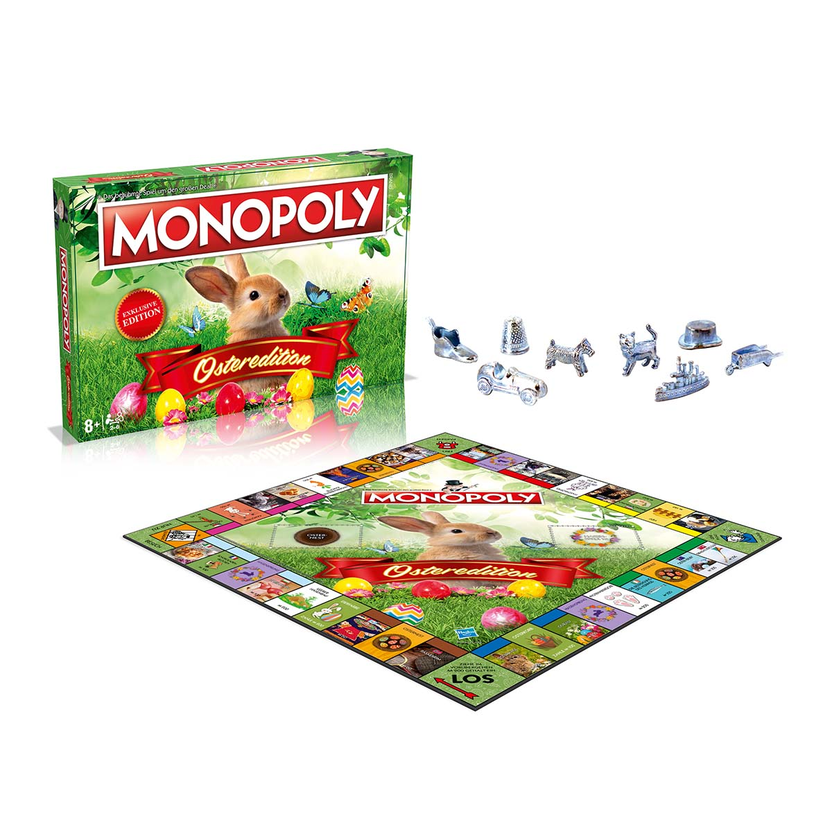 Monopoly Oster Edition Spielbox, Spielbrett und Spielsteine auf weißer Oberfläche.