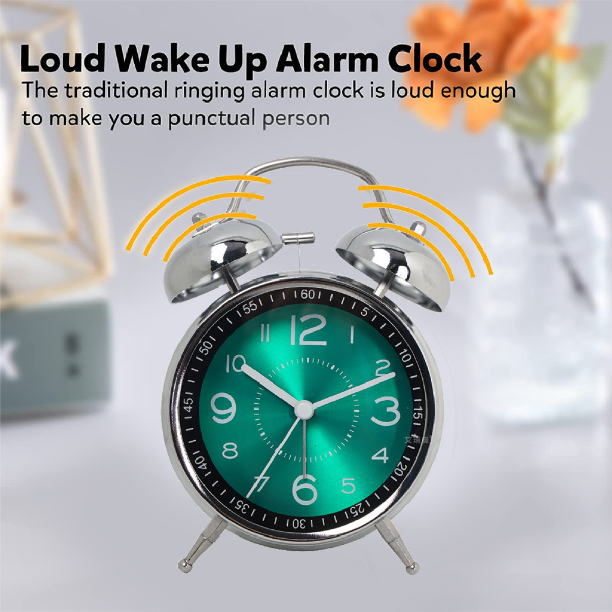 Eine grüne Uhr mit silbernem Rahmen. Text: 'Loud Wake Up Alarm Clock'.