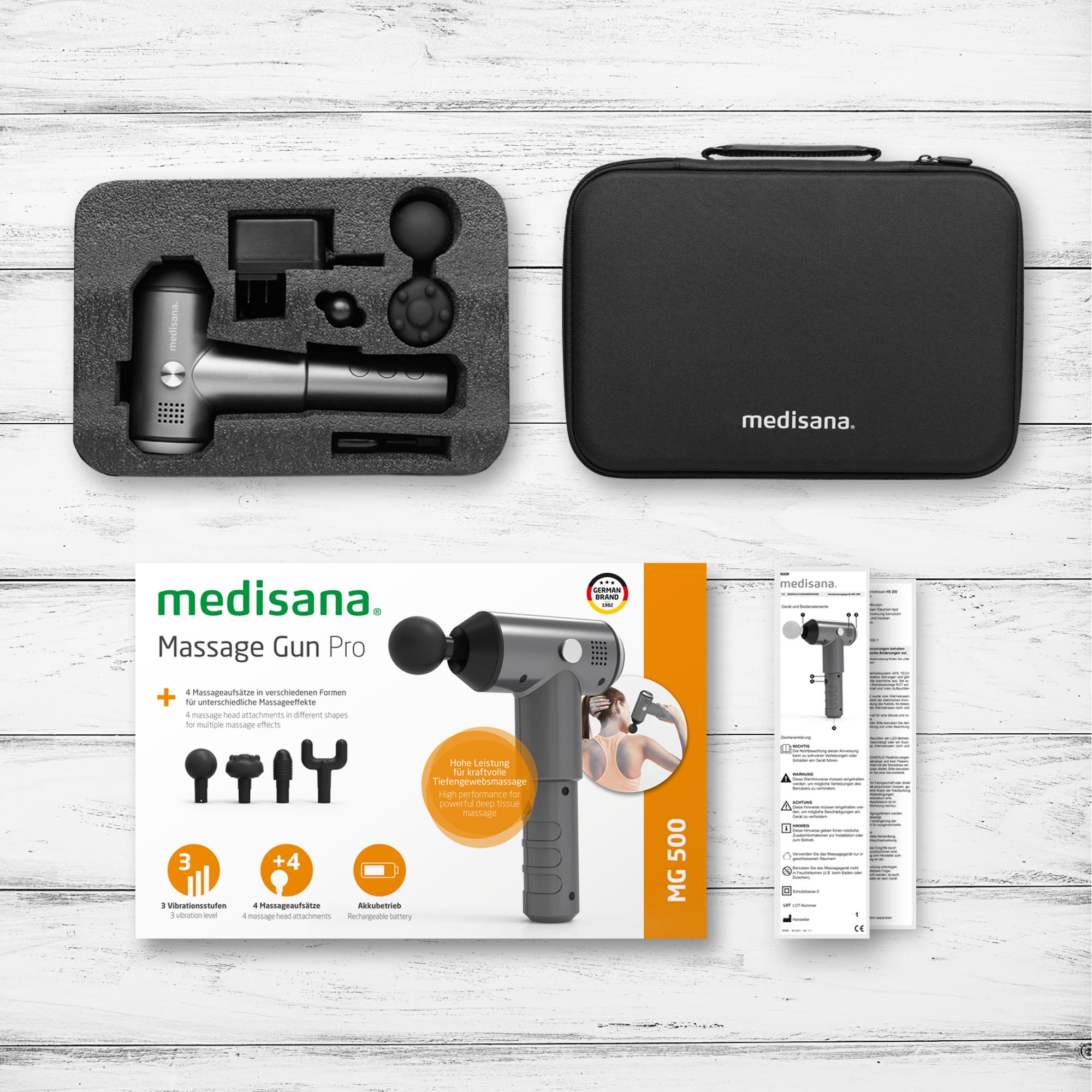 Kit Medisana Massage Gun Pro. Pistola, accesorios, estuche y materiales promocionales.