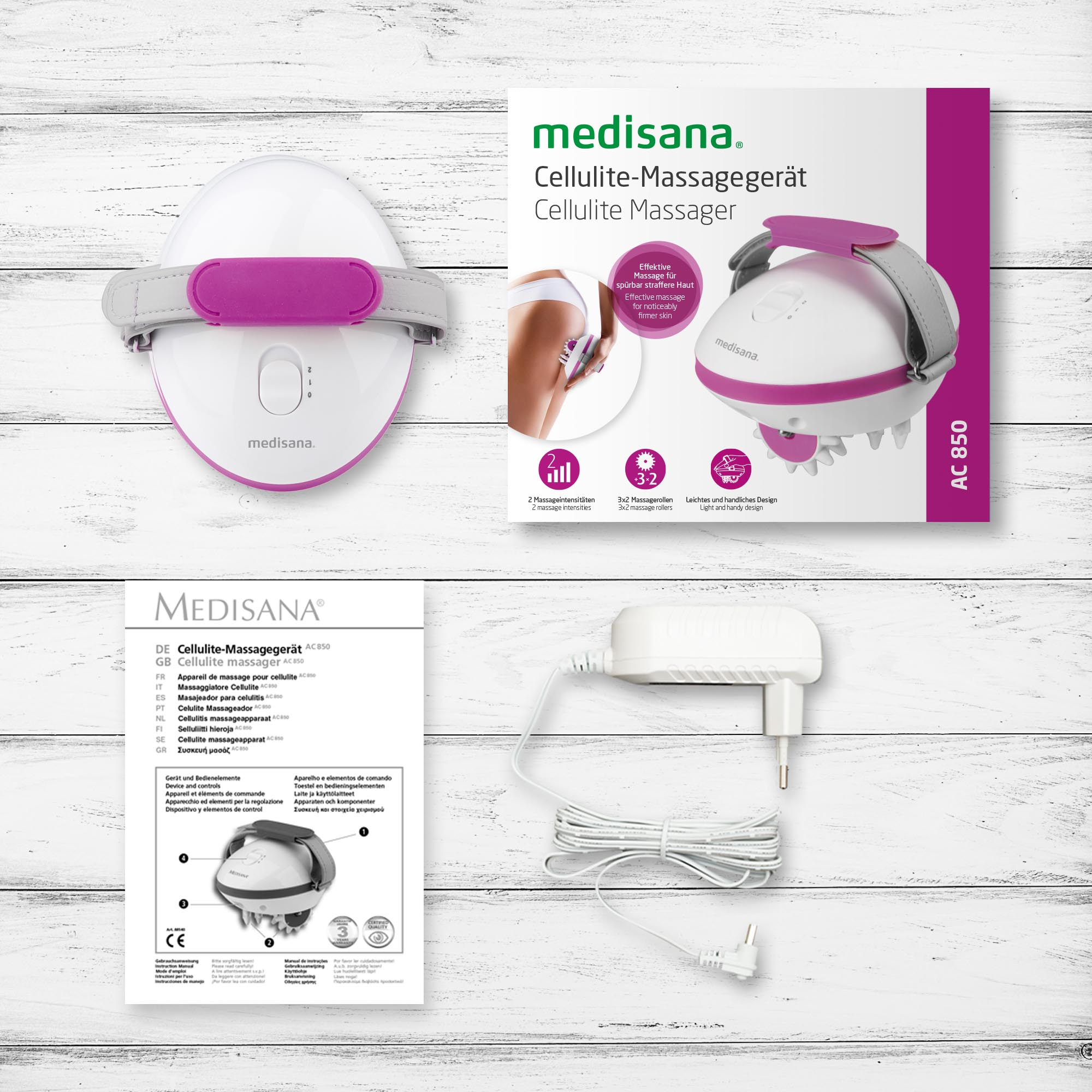 White cellulite massager with pink strap. Packaging shows product and benefits. Includes charger and instructions.