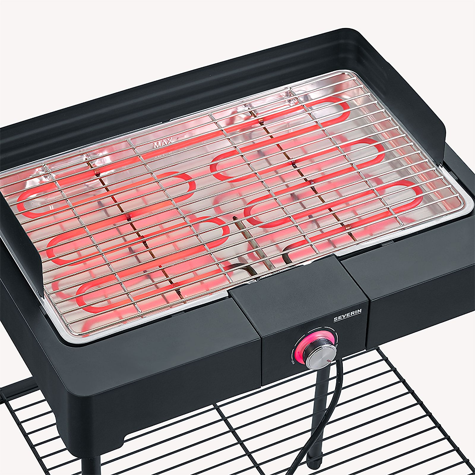 Black electric grill with red heating elements and a temperature control knob.