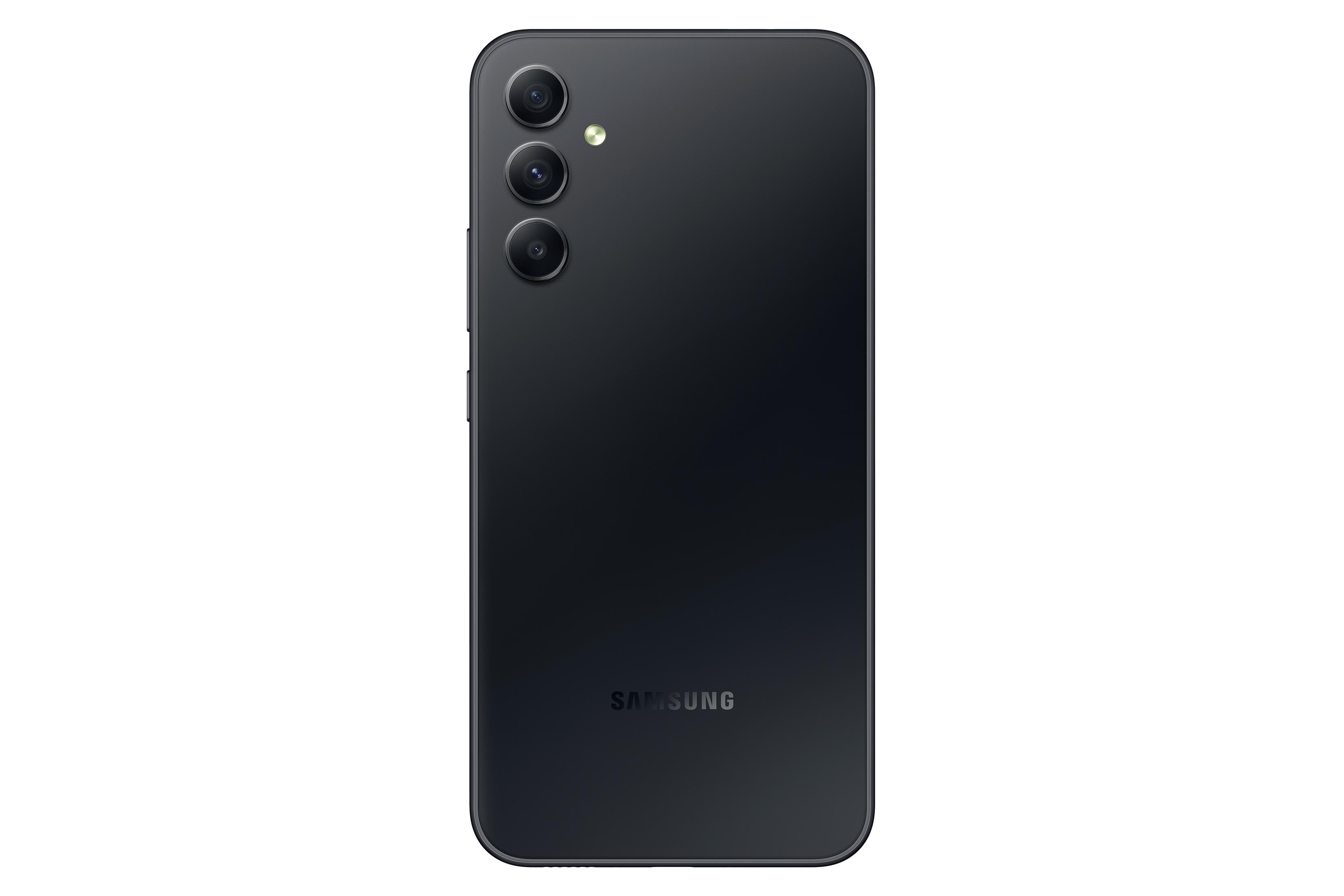 Czarny smartfon widziany od tyłu. Potrójny aparat. Logo Samsung na dole.