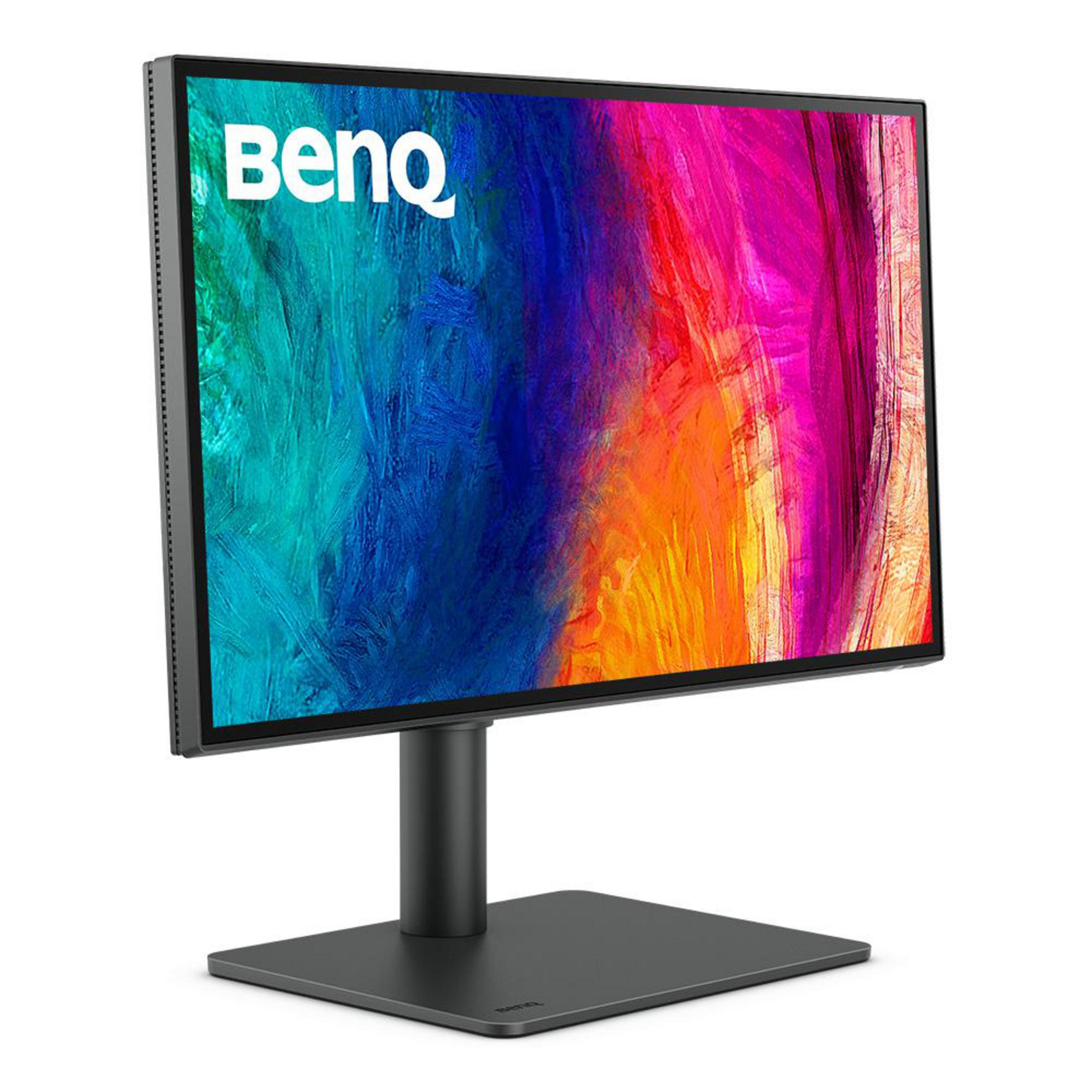 Monitor BenQ, bisel negro, sobre un soporte negro. La pantalla muestra arte abstracto colorido. Fondo blanco.
