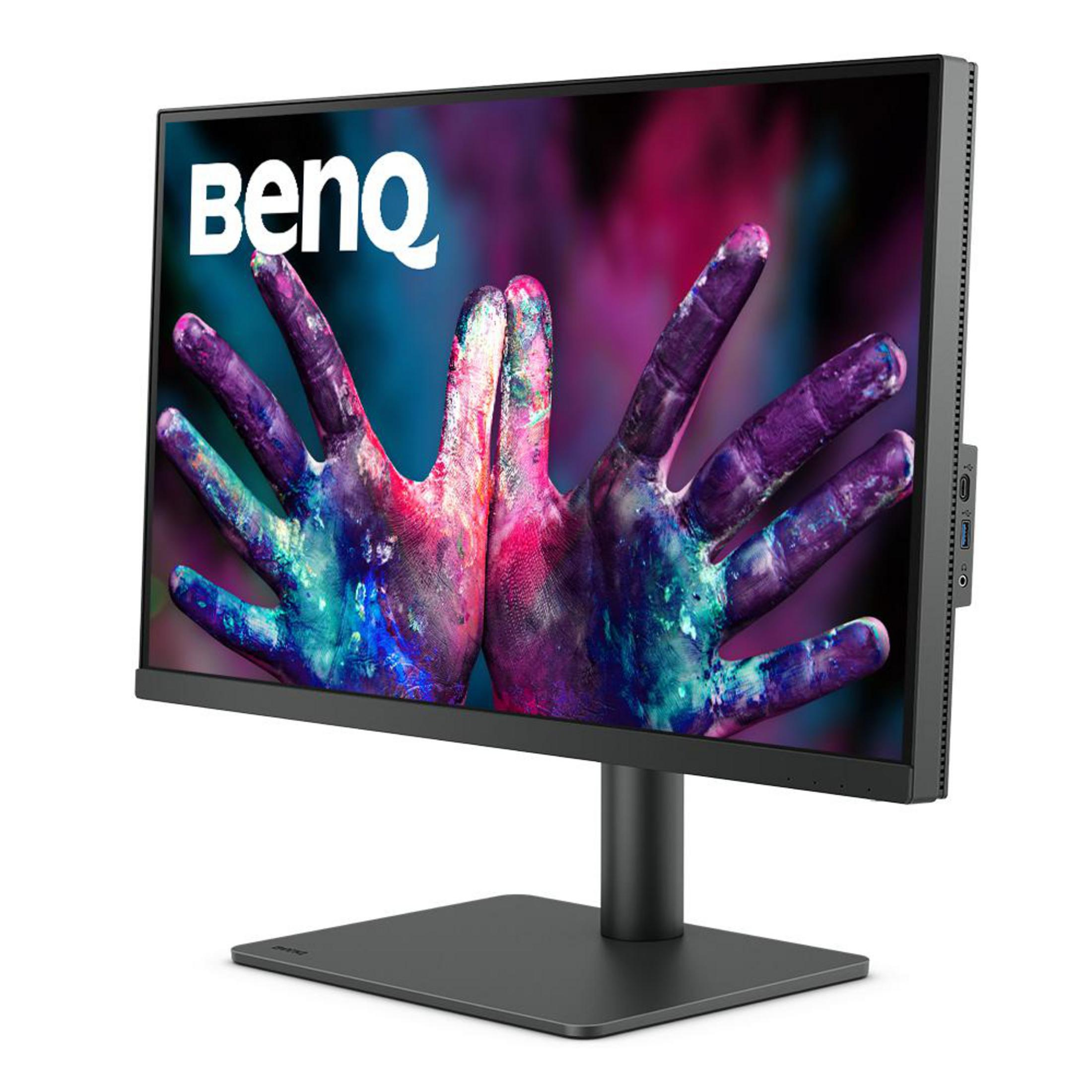 Monitor BenQ z czarną podstawą. Ekran wyświetla kolorowy obraz dłoni.