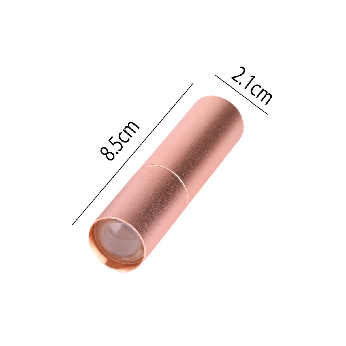 Ein roségoldfarbenes Lippenstift-ähnliches Objekt mit beschrifteten Abmessungen, auf weißer Oberfläche.
