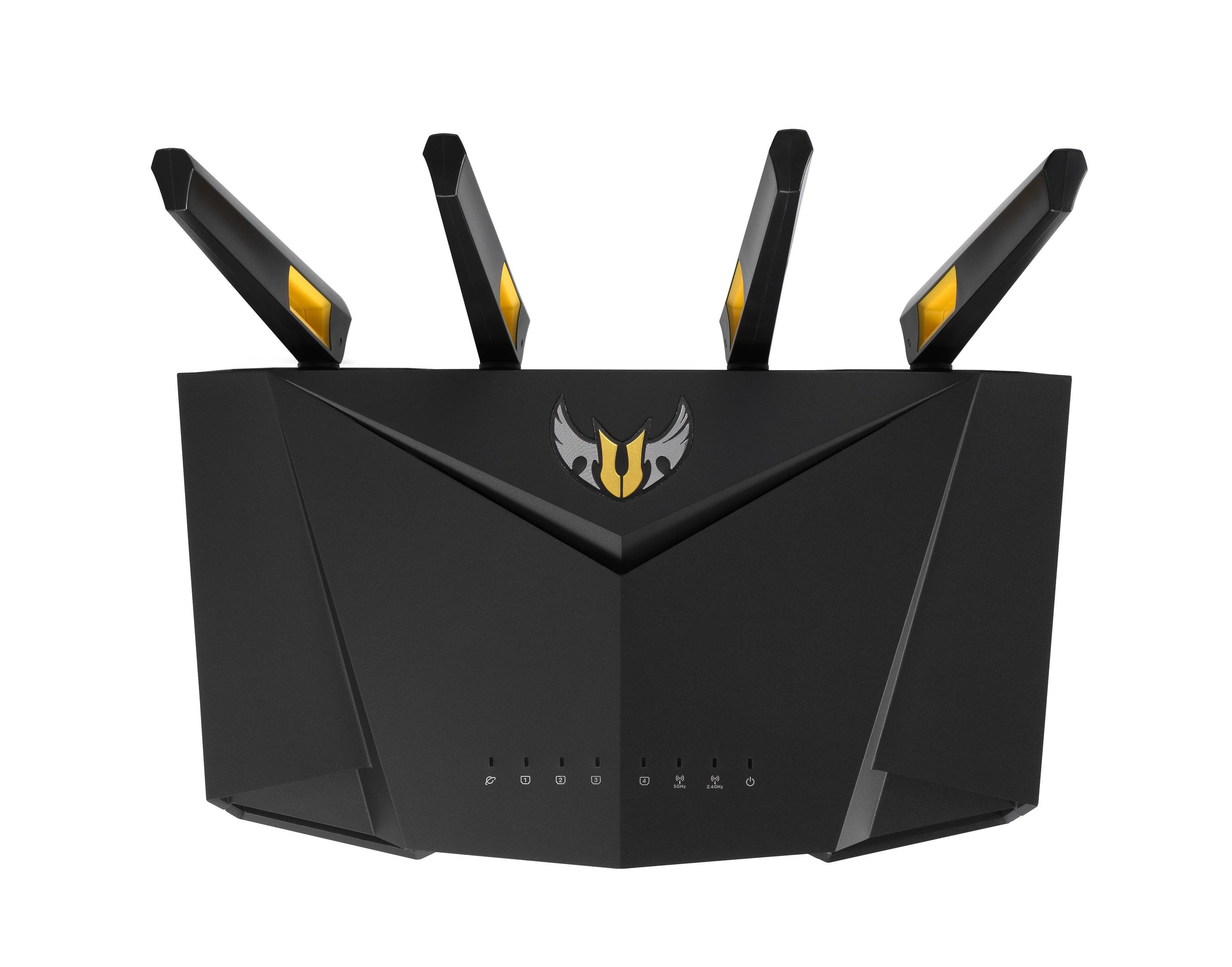 Router nero con quattro antenne, punte gialle. Emblema dorato al centro. Isolato su sfondo bianco.