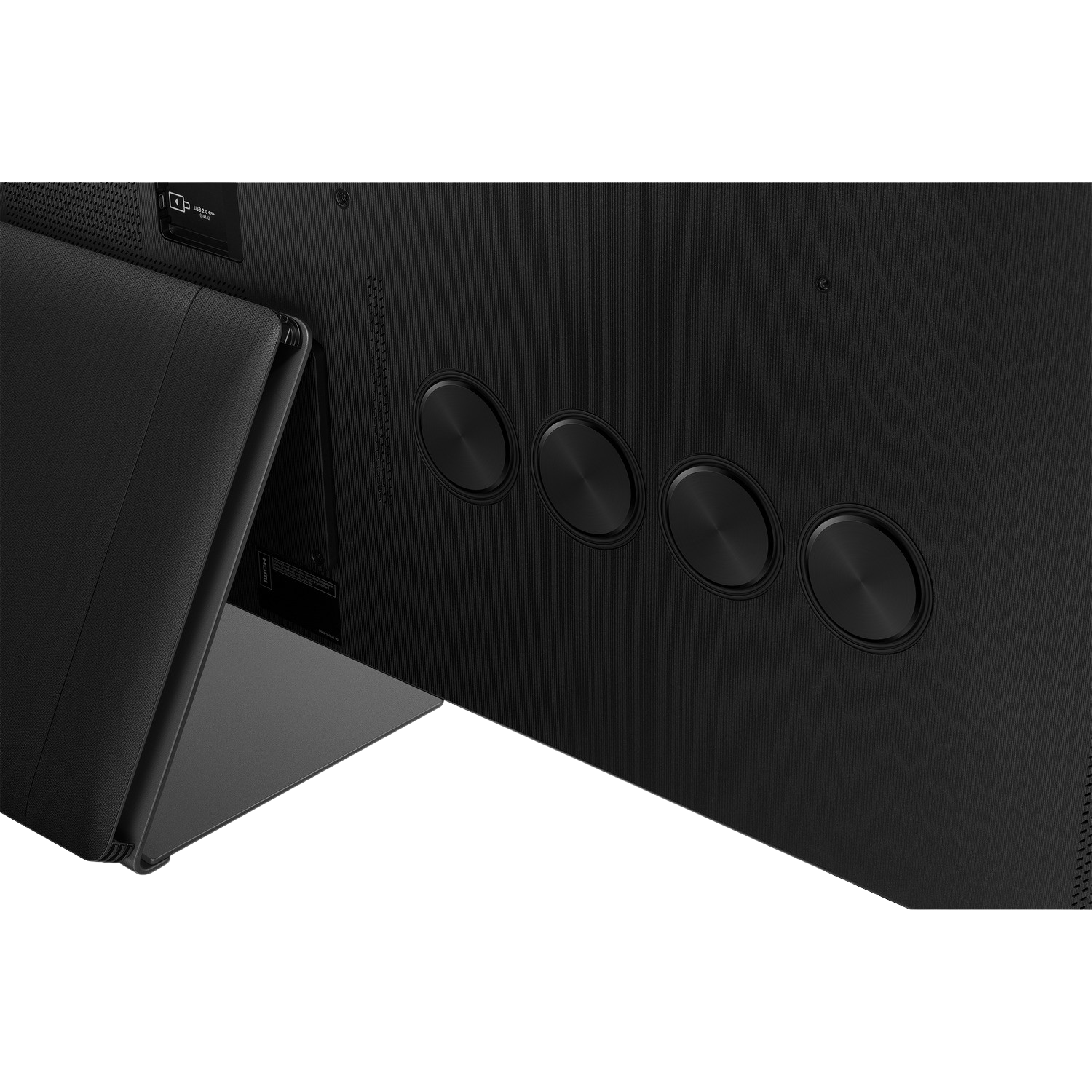 Czarny panel tylny TV z 4 czarnymi okrągłymi portami. Czarny panel jest pochylony i otwarty.