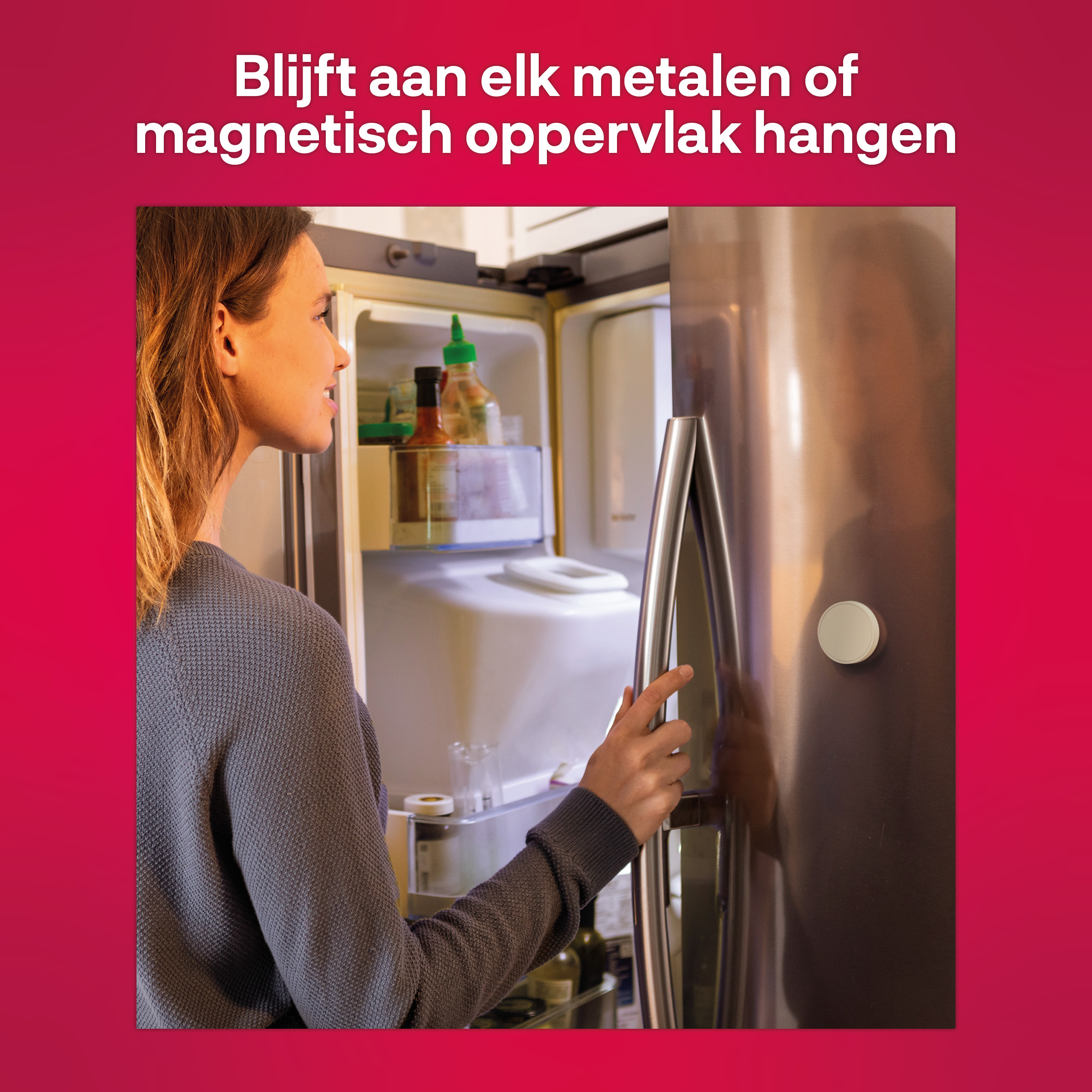 Woman opening a refrigerator door, with a fridge magnet on the door. Text says: Sticks to metal surfaces.