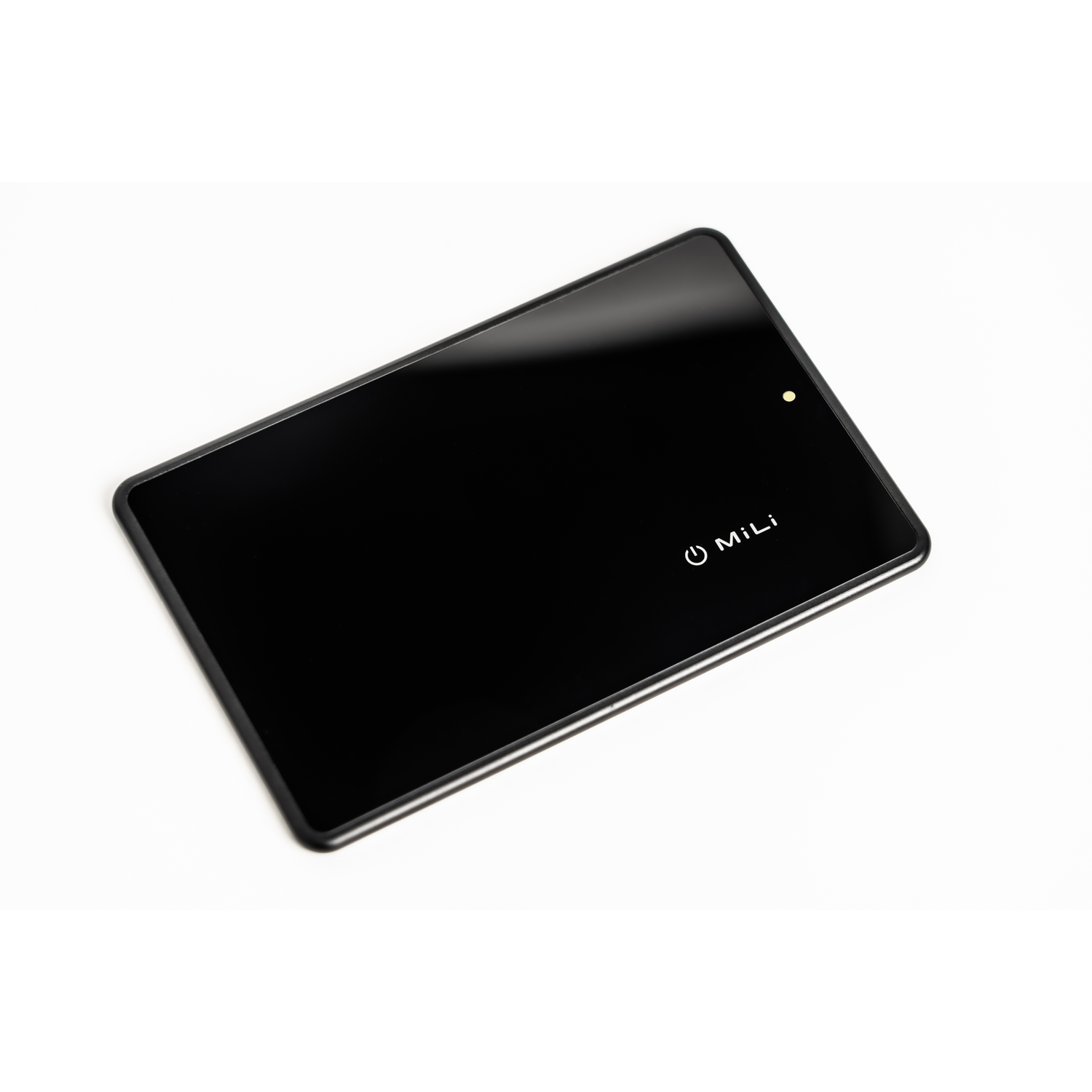 Black MiLi tablet on white background.
