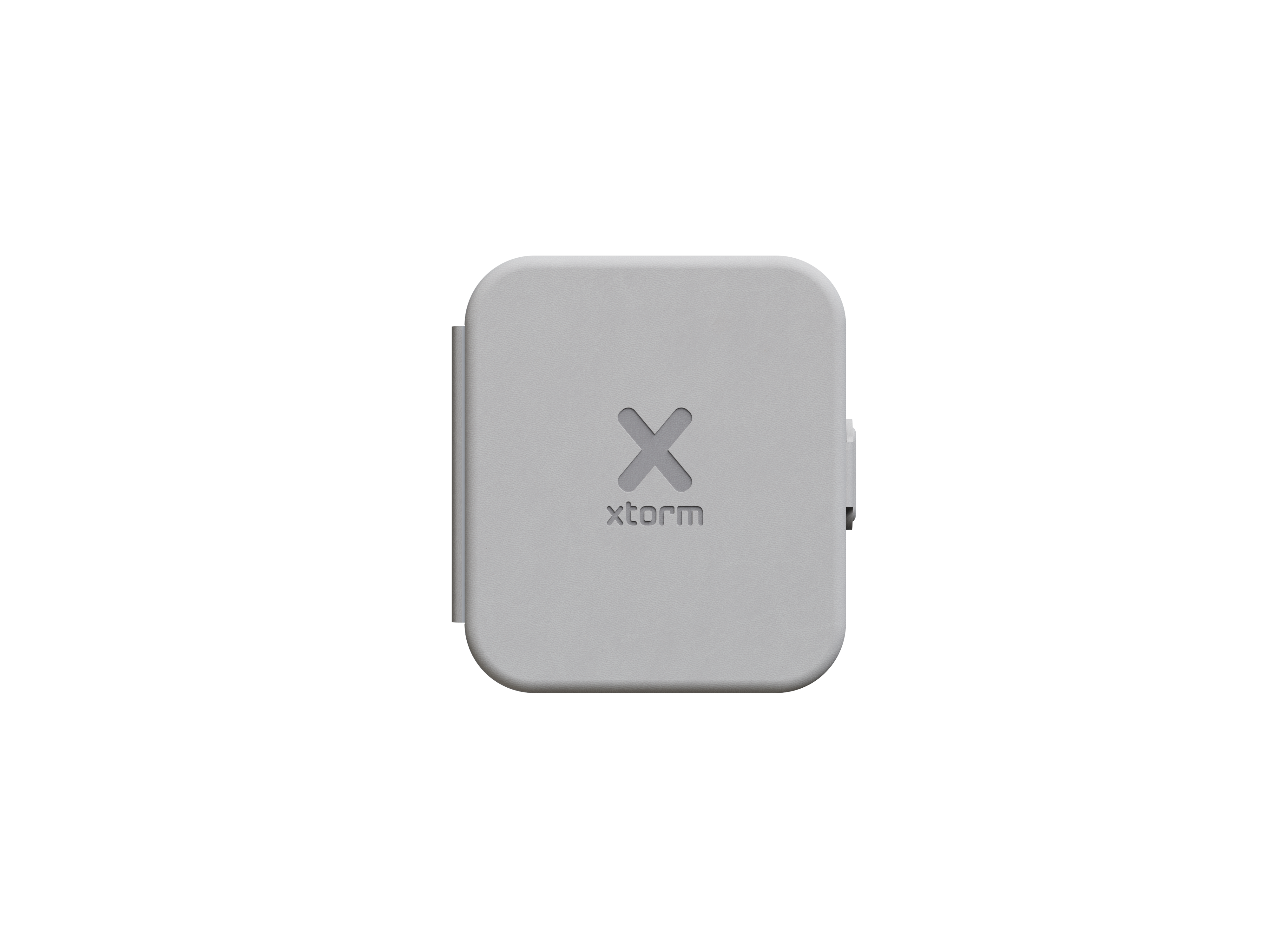 Ein hellgraues X-förmiges Gerät mit dem xtorm-Logo. Das Gerät hat eine quadratische Form und einen schwarzen Hintergrund.