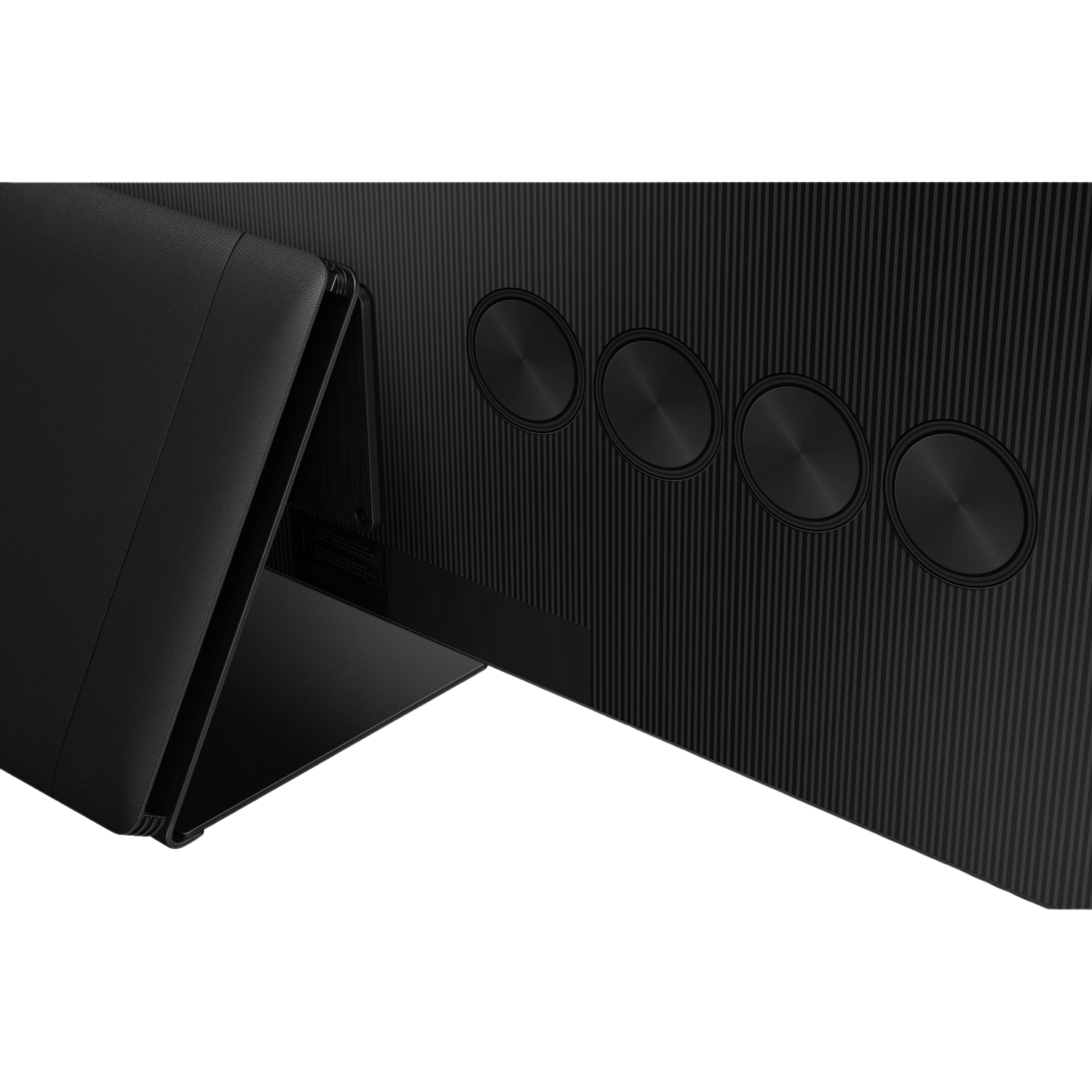 Zbliżenie tyłu czarnego telewizora pokazujące okrągłe porty wejściowe.