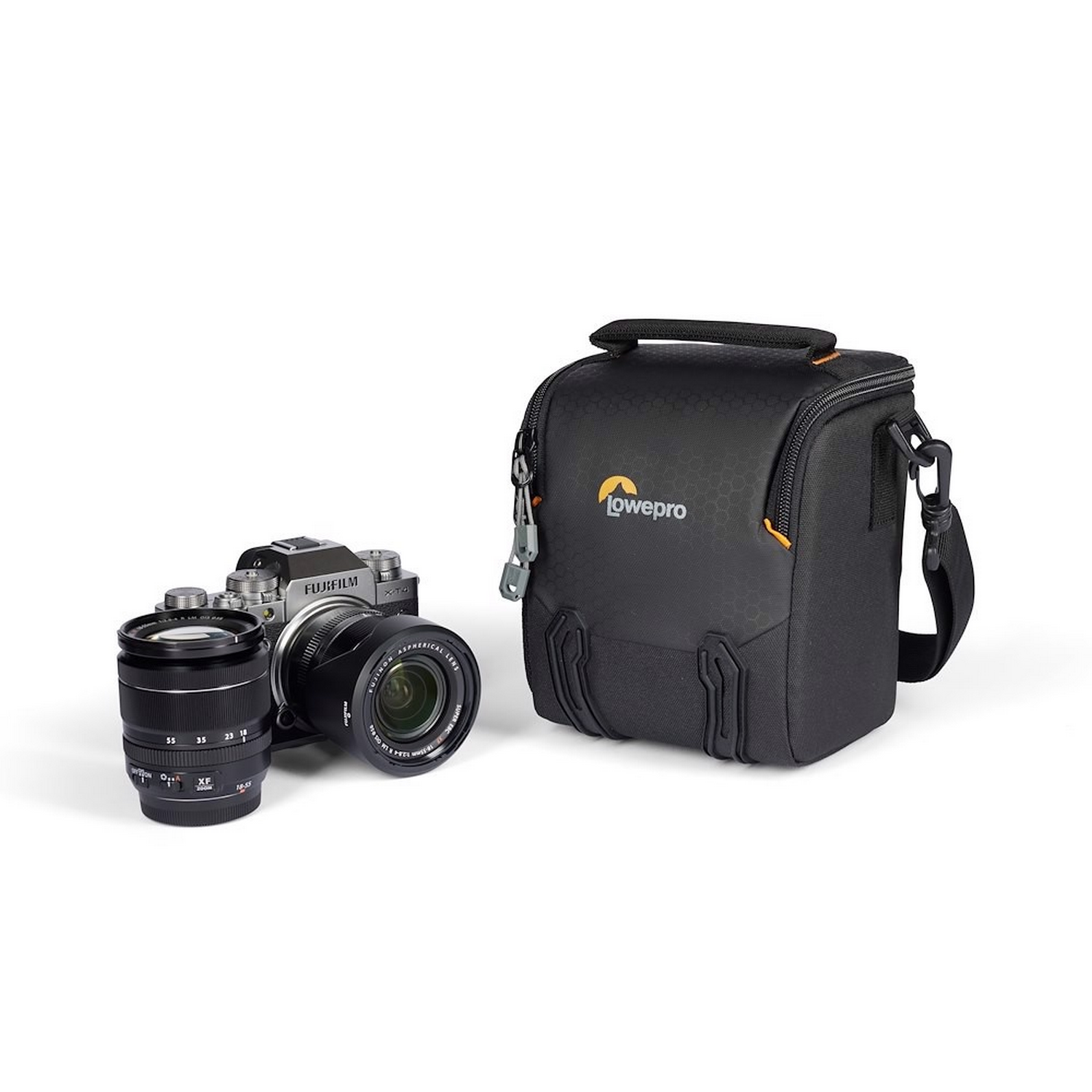 Camera with two lenses and a black Lowepro bag. White background.