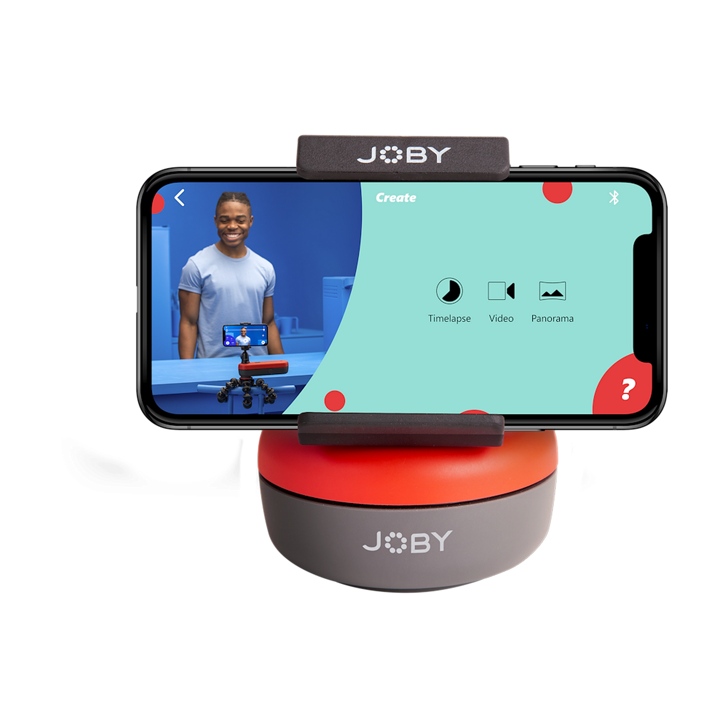 Een smartphone op een statief, met een video-opname-interface, met een lachende man op het scherm.