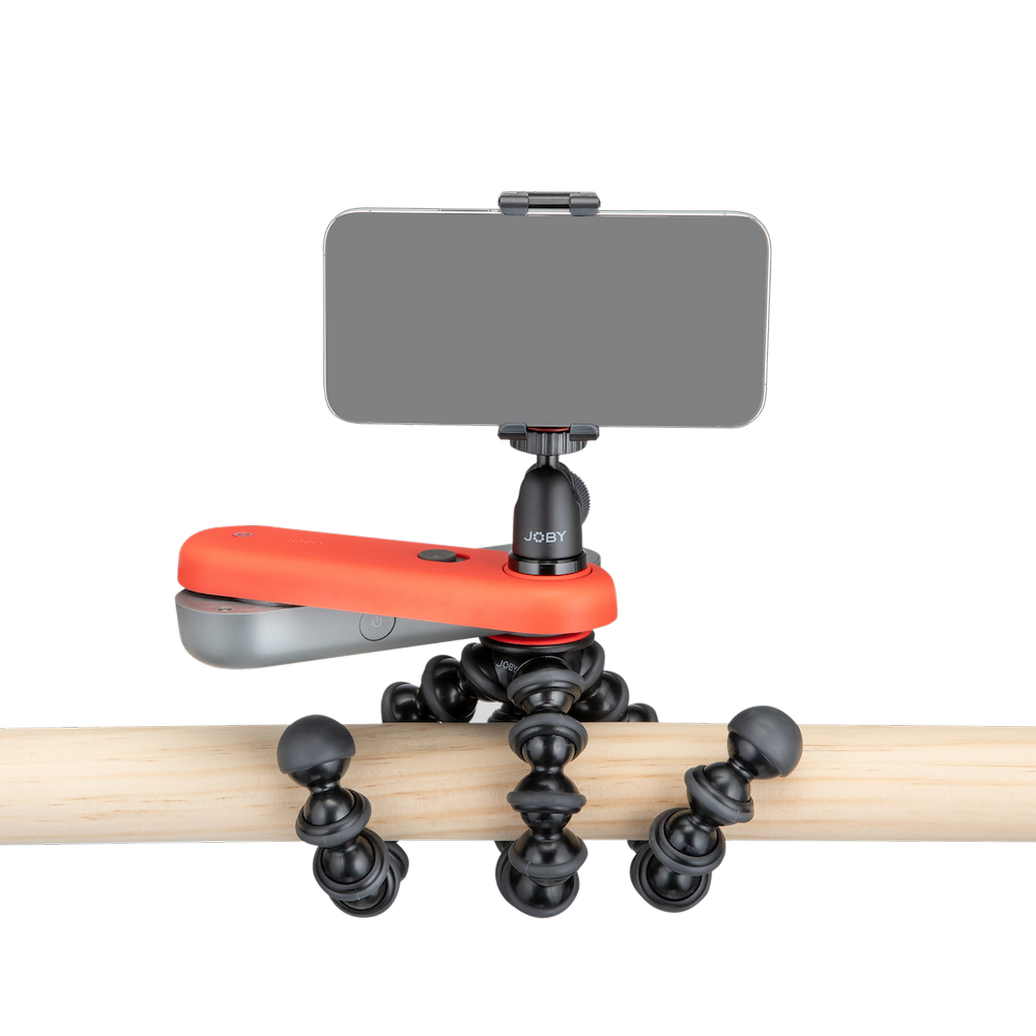 Un smartphone sostenido por un trípode flexible con patas flexibles, sobre un fondo negro.