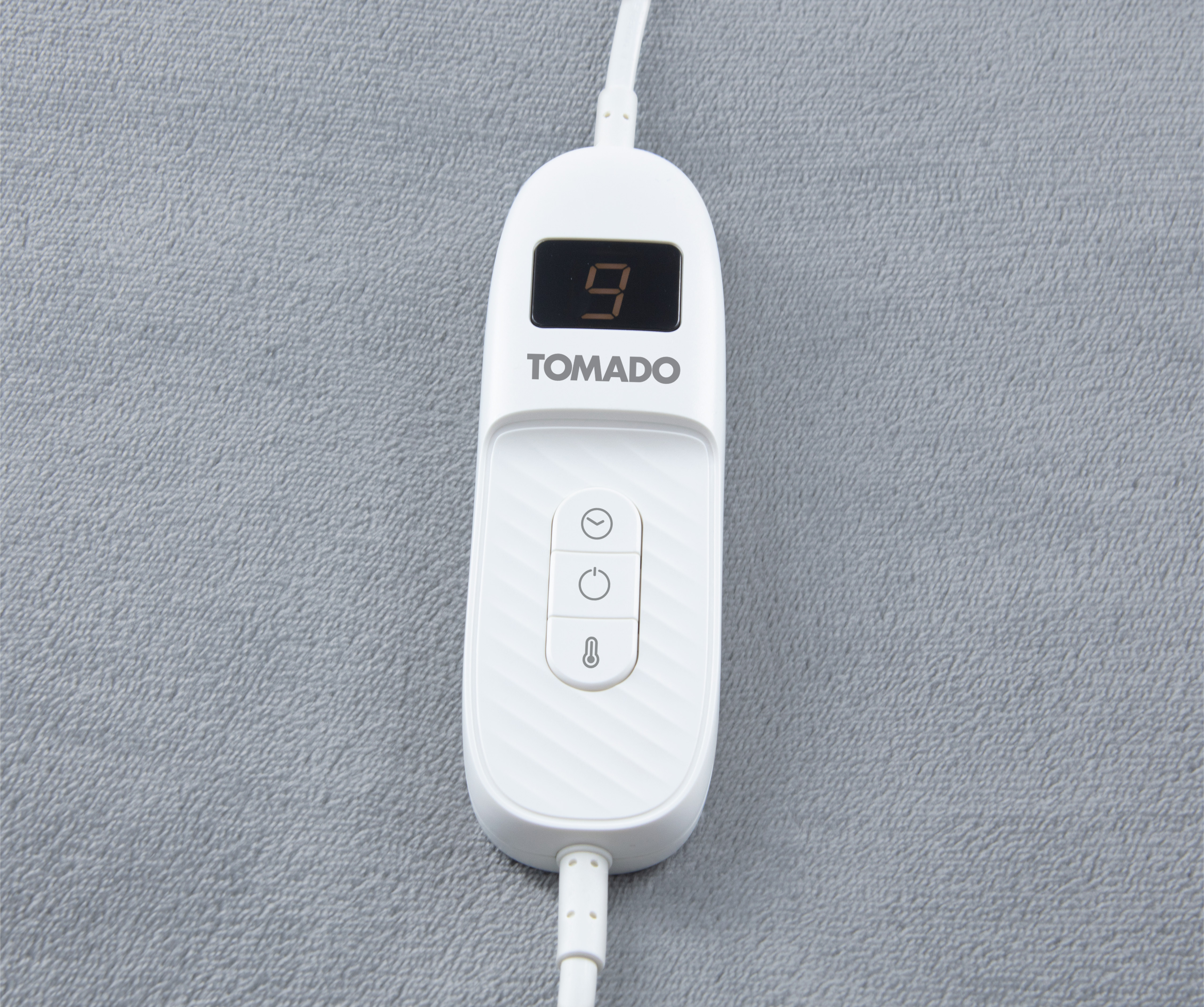 Weißer Controller mit Digitalanzeige, die '9' anzeigt. Hat Tasten für Zeit, Leistung und Temperatur.