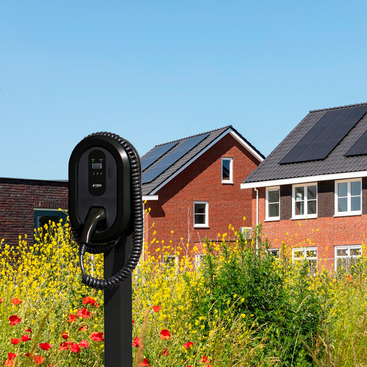 EV charger on a pole with a car charging in a sunny environment.