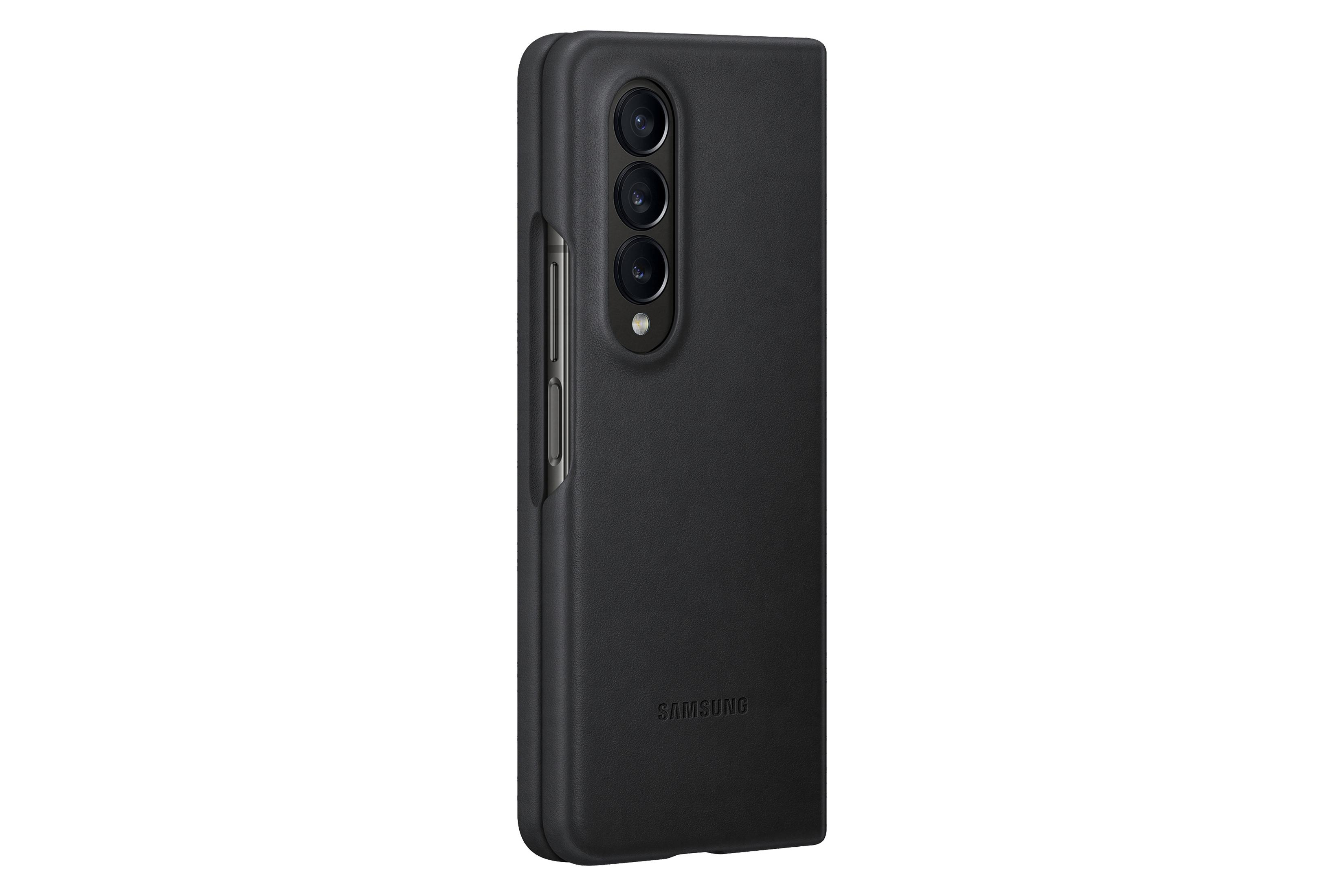 Teléfono Samsung negro, plegado, con cámaras visibles, sobre fondo blanco.