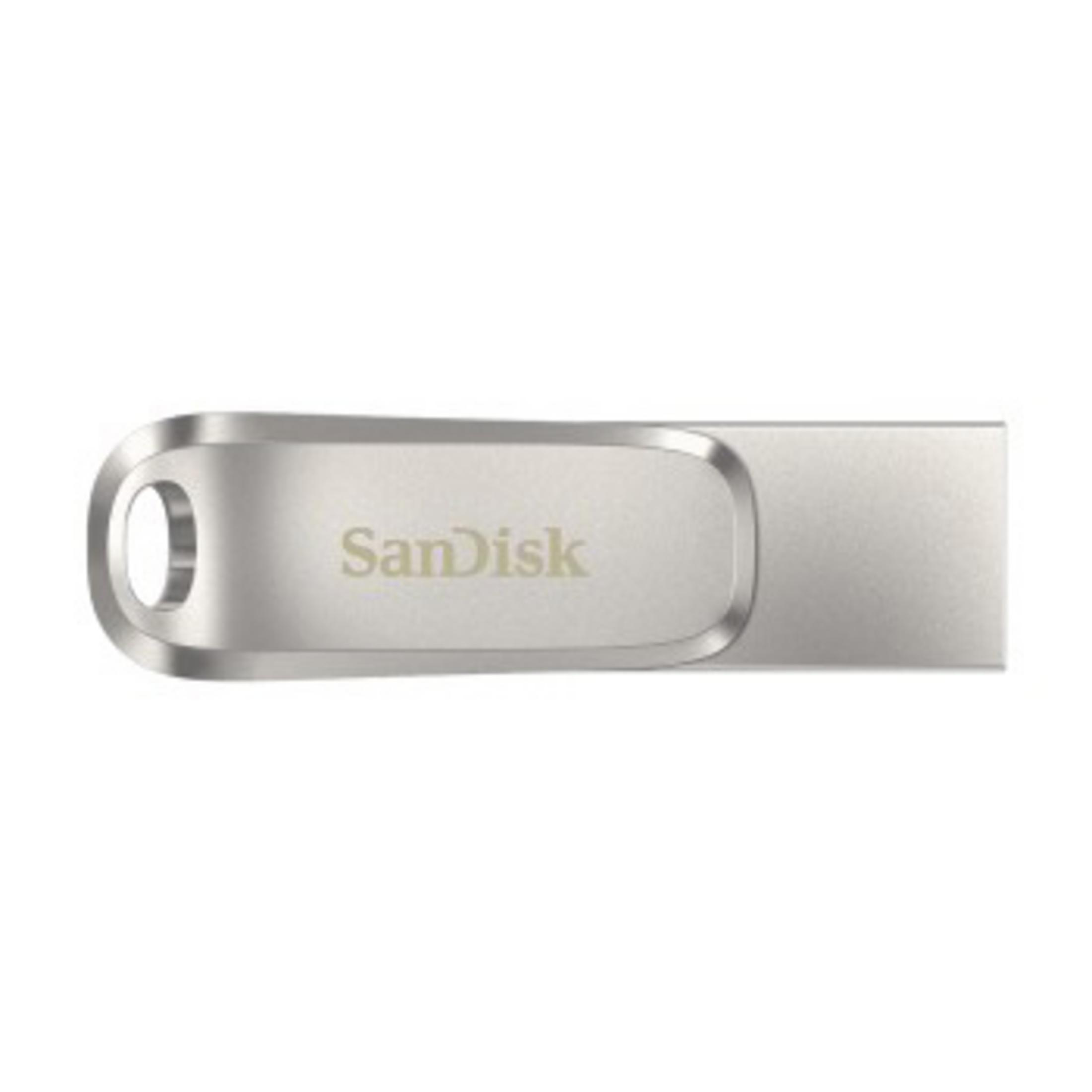 Srebrny pendrive z logo Sandisk na białym tle.