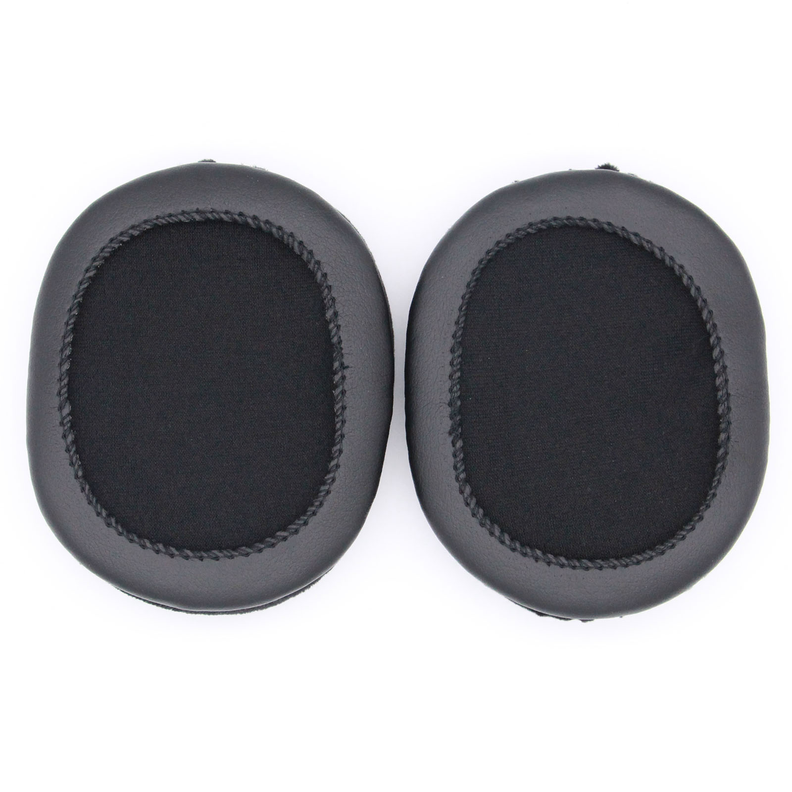 Dos almohadillas negras para auriculares, de forma ovalada, sobre fondo blanco.
