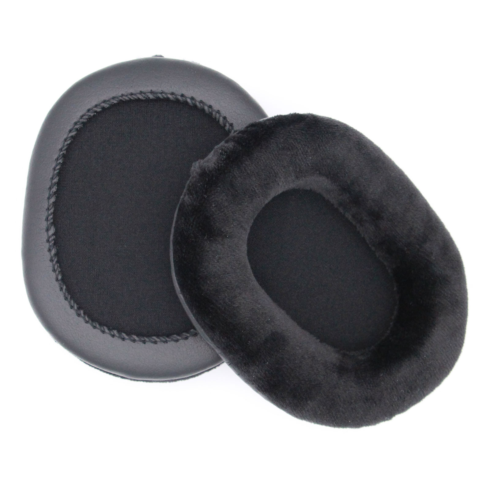 Dos almohadillas negras, una encima de la otra, aisladas sobre fondo blanco.