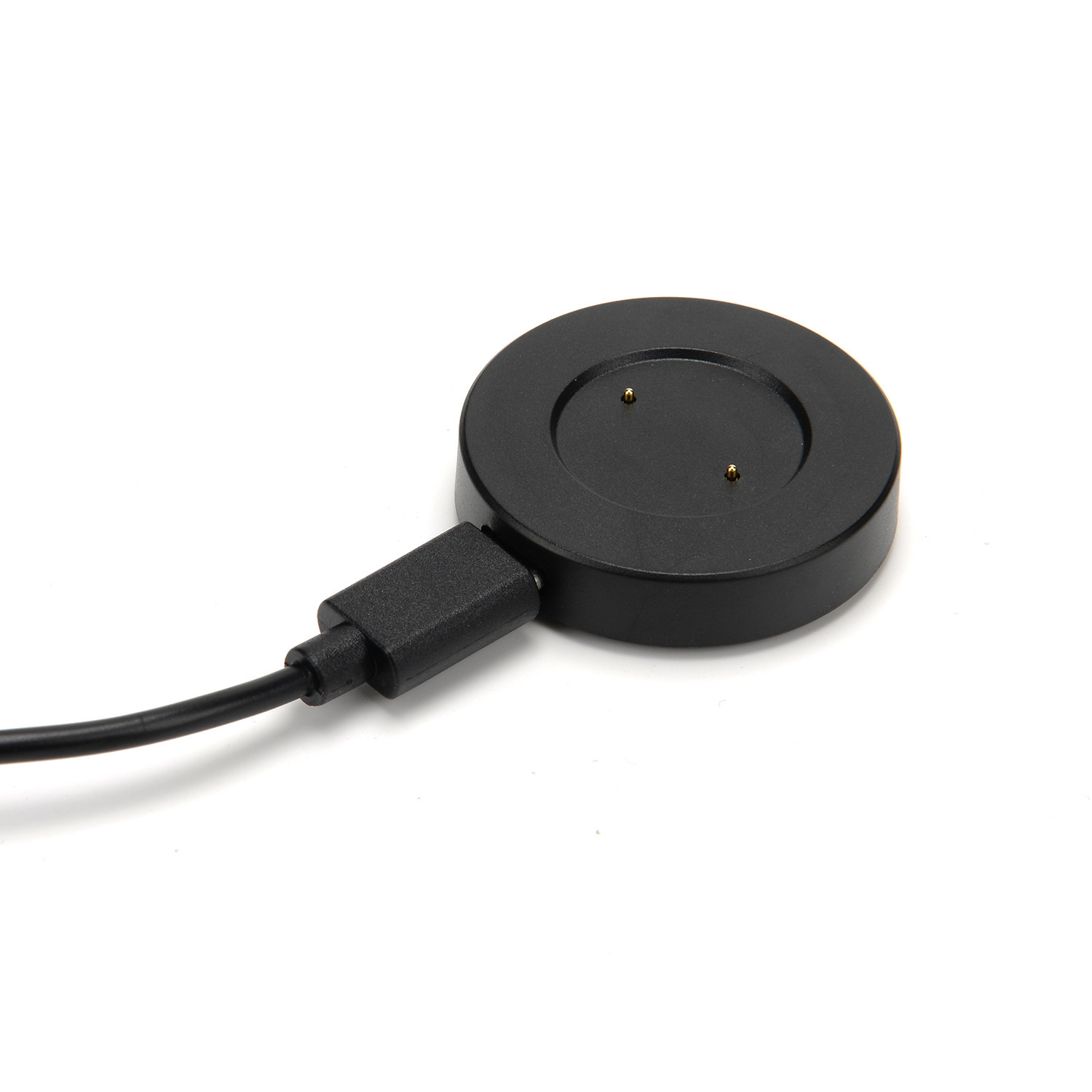 Schwarze Smartwatch-Ladebasis mit eingestecktem Kabel. Weiße Oberfläche im Hintergrund.