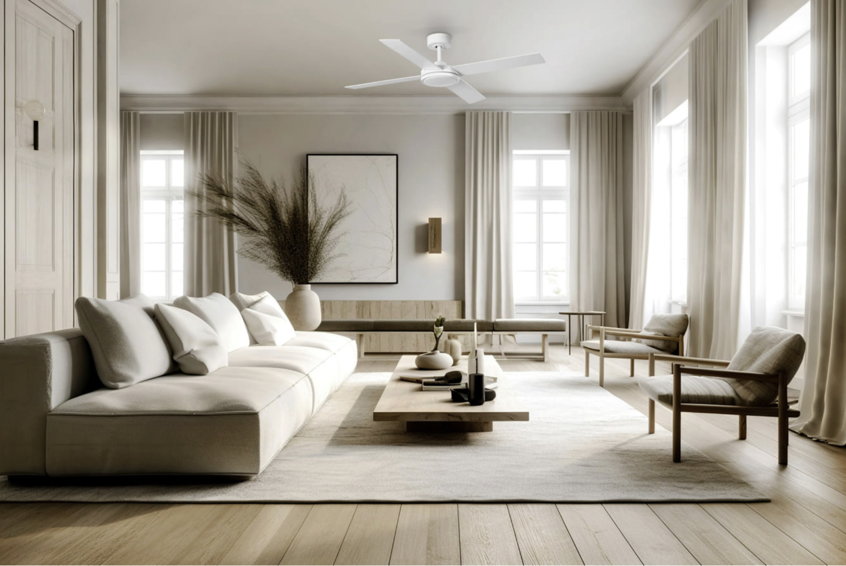 Wohnzimmer mit beigen Möbeln und einem weißen Deckenventilator.