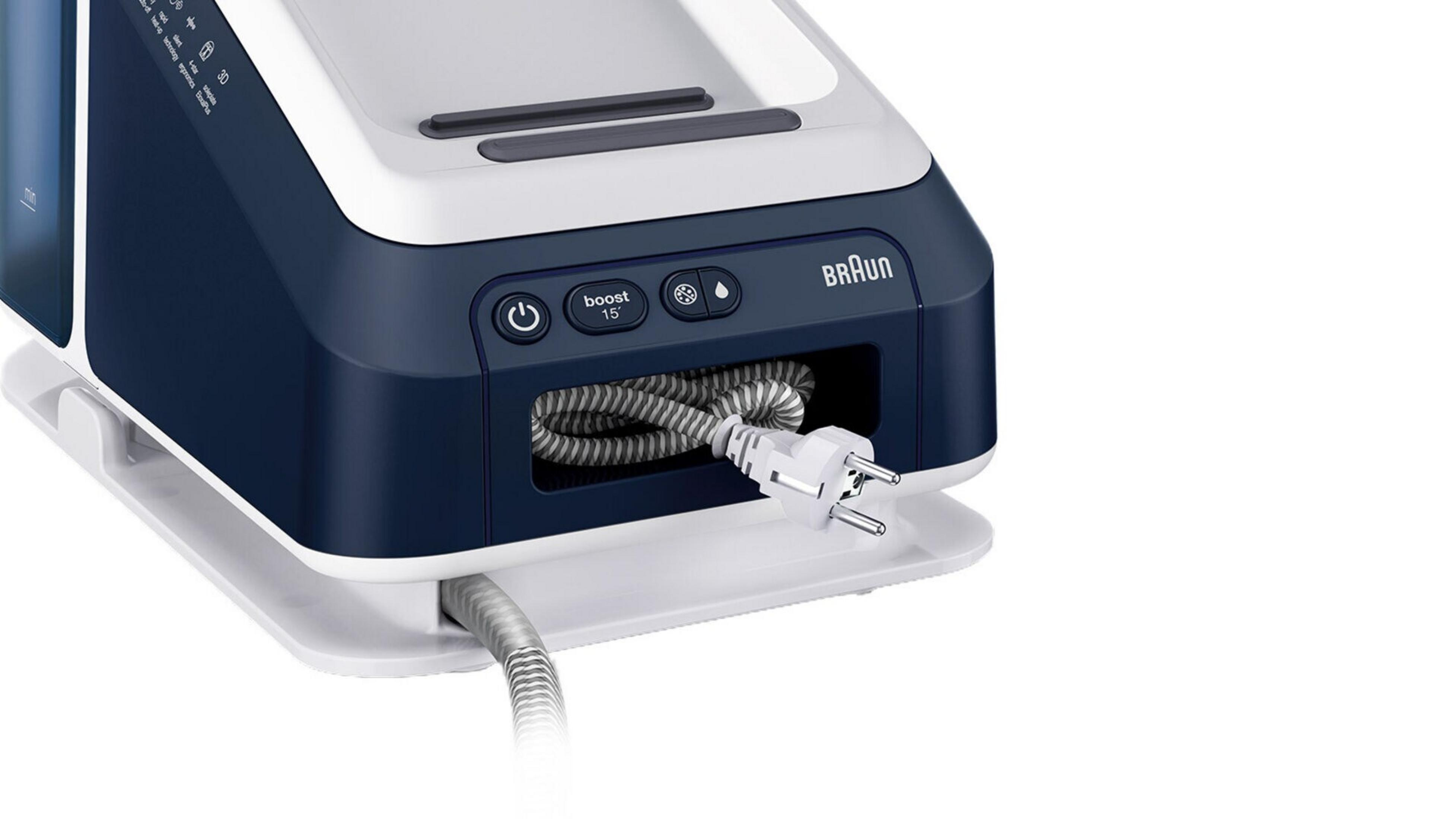 Close-up of a blue and white Braun iron with the power cord visible.