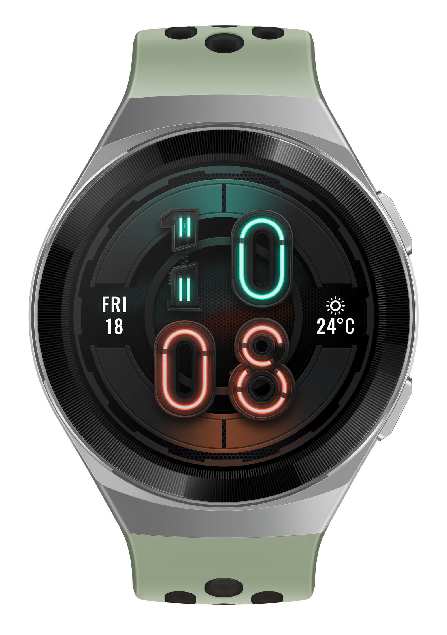 Smartwatch z zielonym paskiem i srebrną obudową. Wyświetla czas i inne wskaźniki.