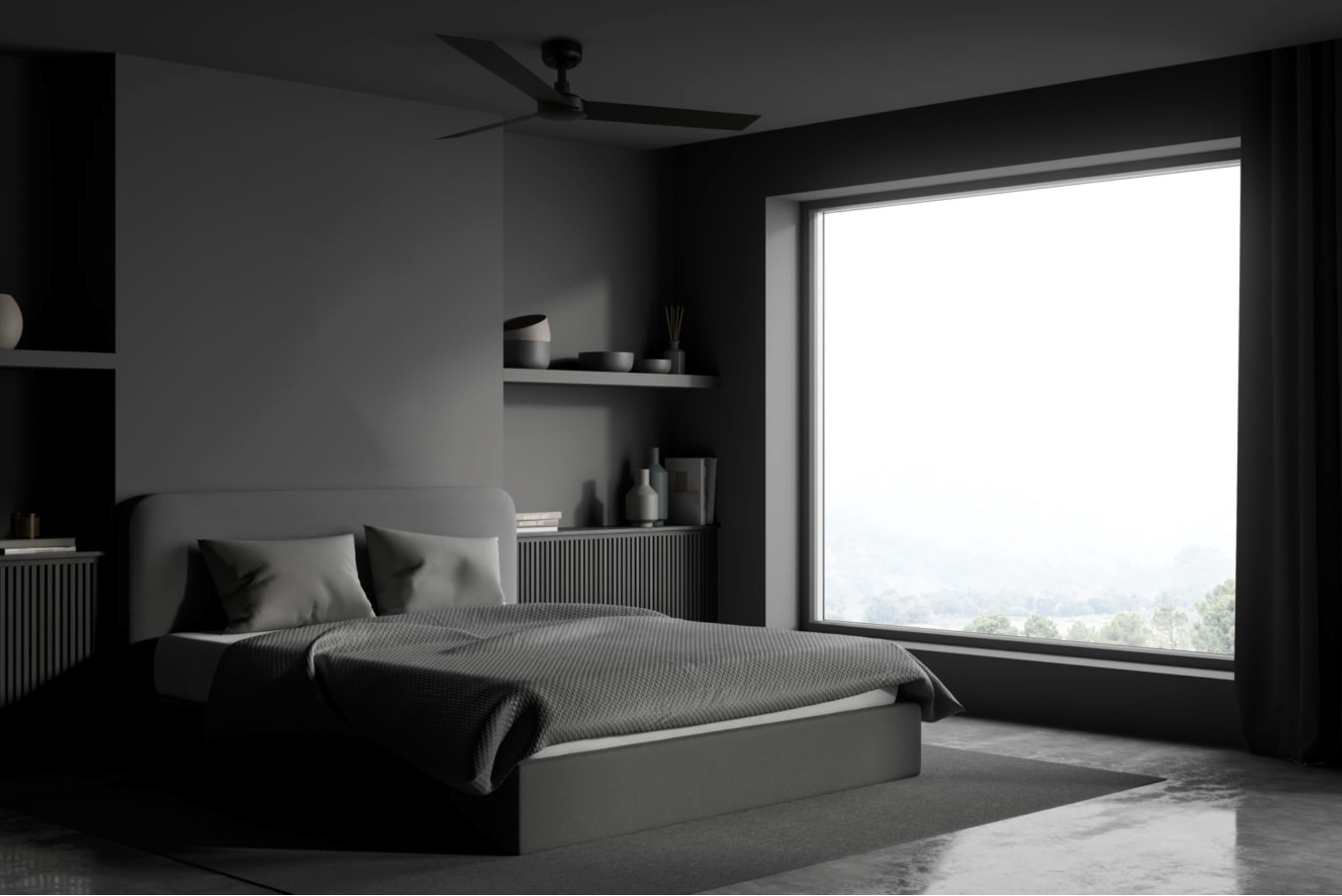Una camera da letto moderna con pareti grigie, un letto, un ventilatore a soffitto e una grande finestra.