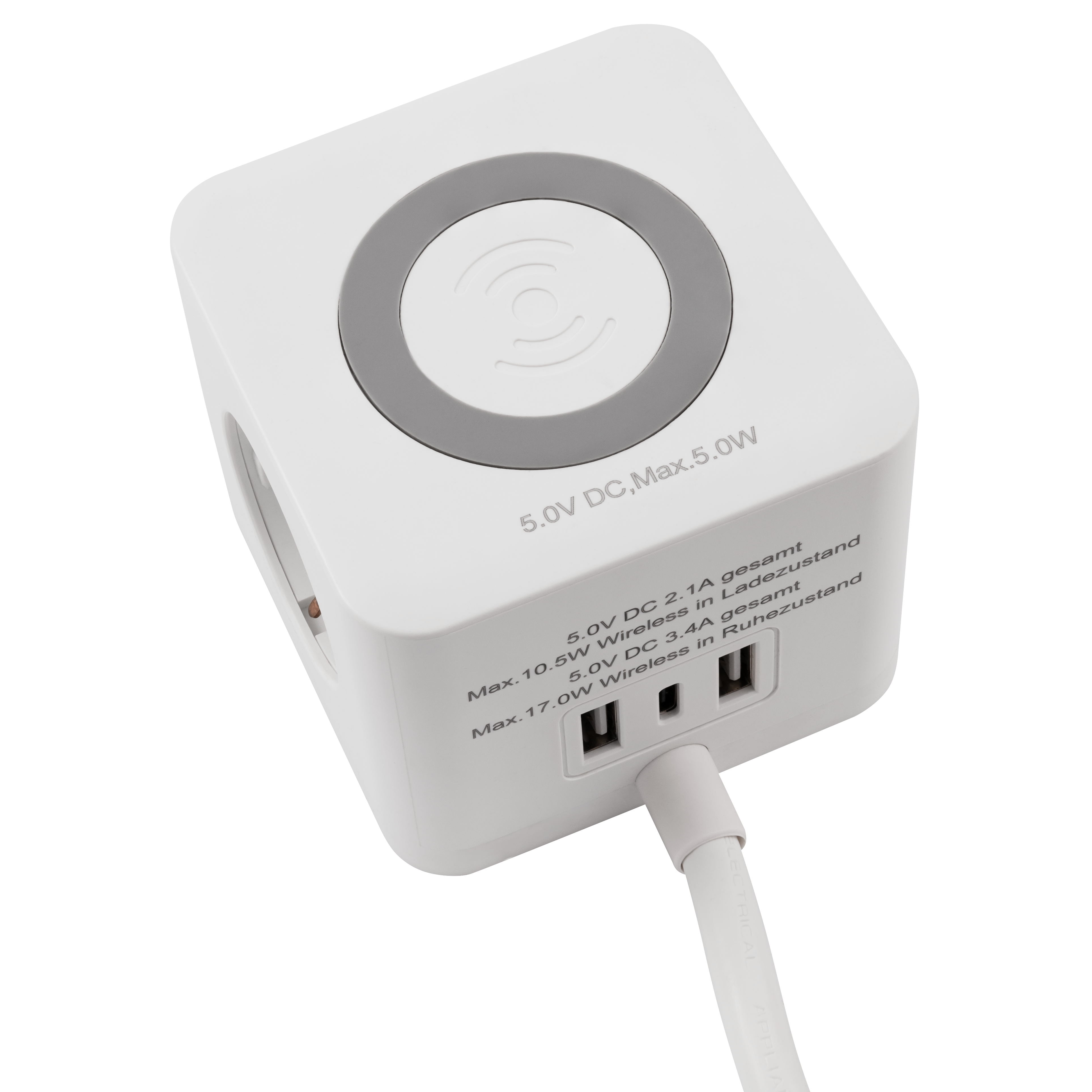 Ein weißer Würfel mit einem kabellosen Ladepad und USB-Anschlüssen.