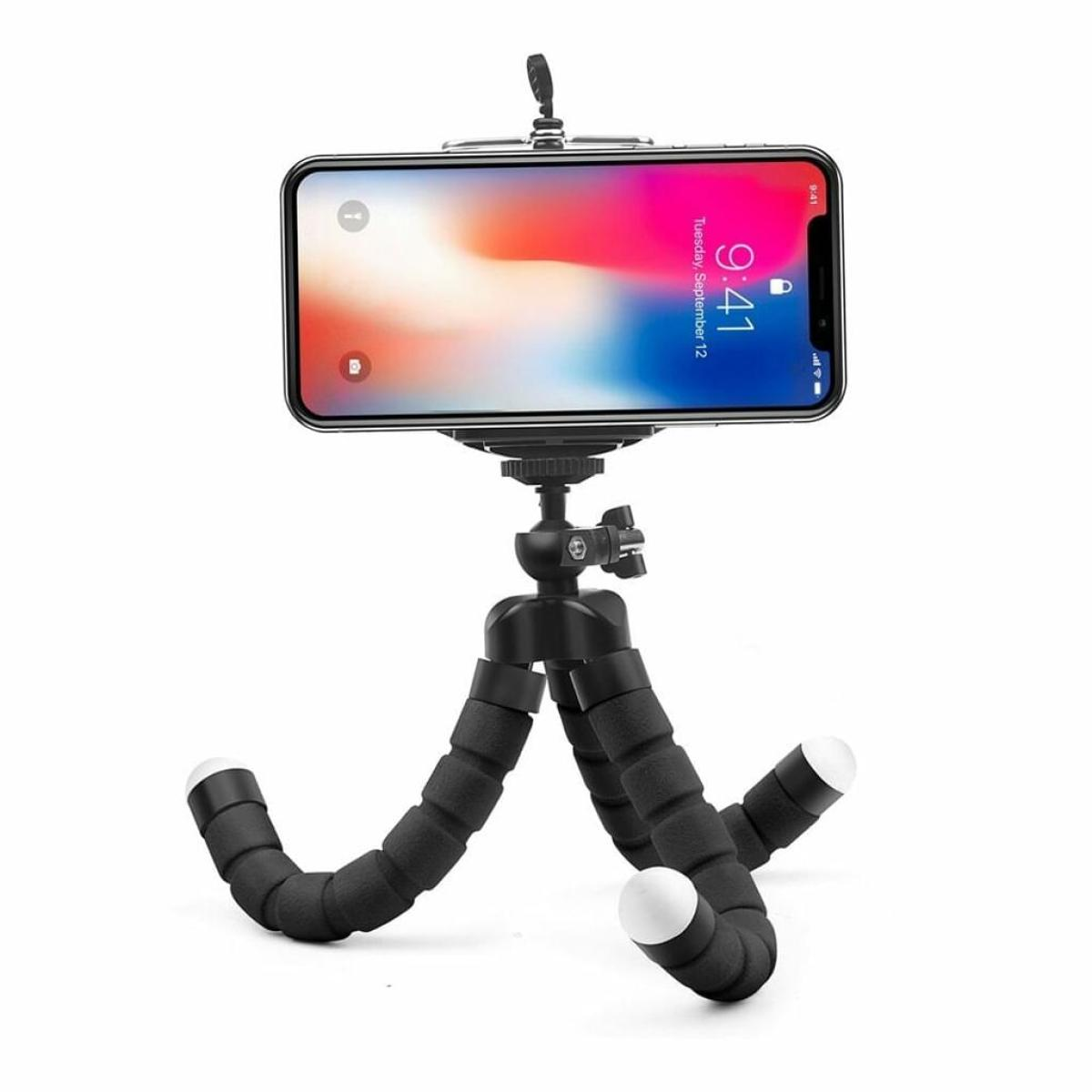 Ein Telefon auf einem flexiblen Stativ mit weißen Spitzen.