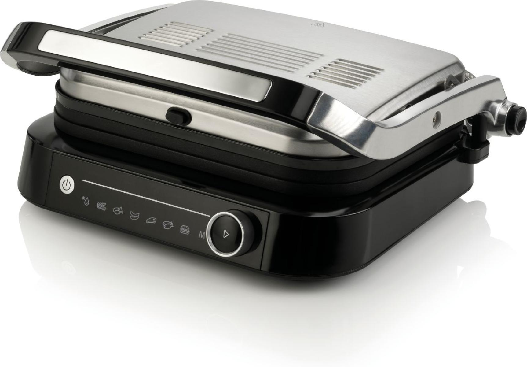 Grill elektryczny. Czarna podstawa, srebrna góra. Ma pokrętło i kontrolki.